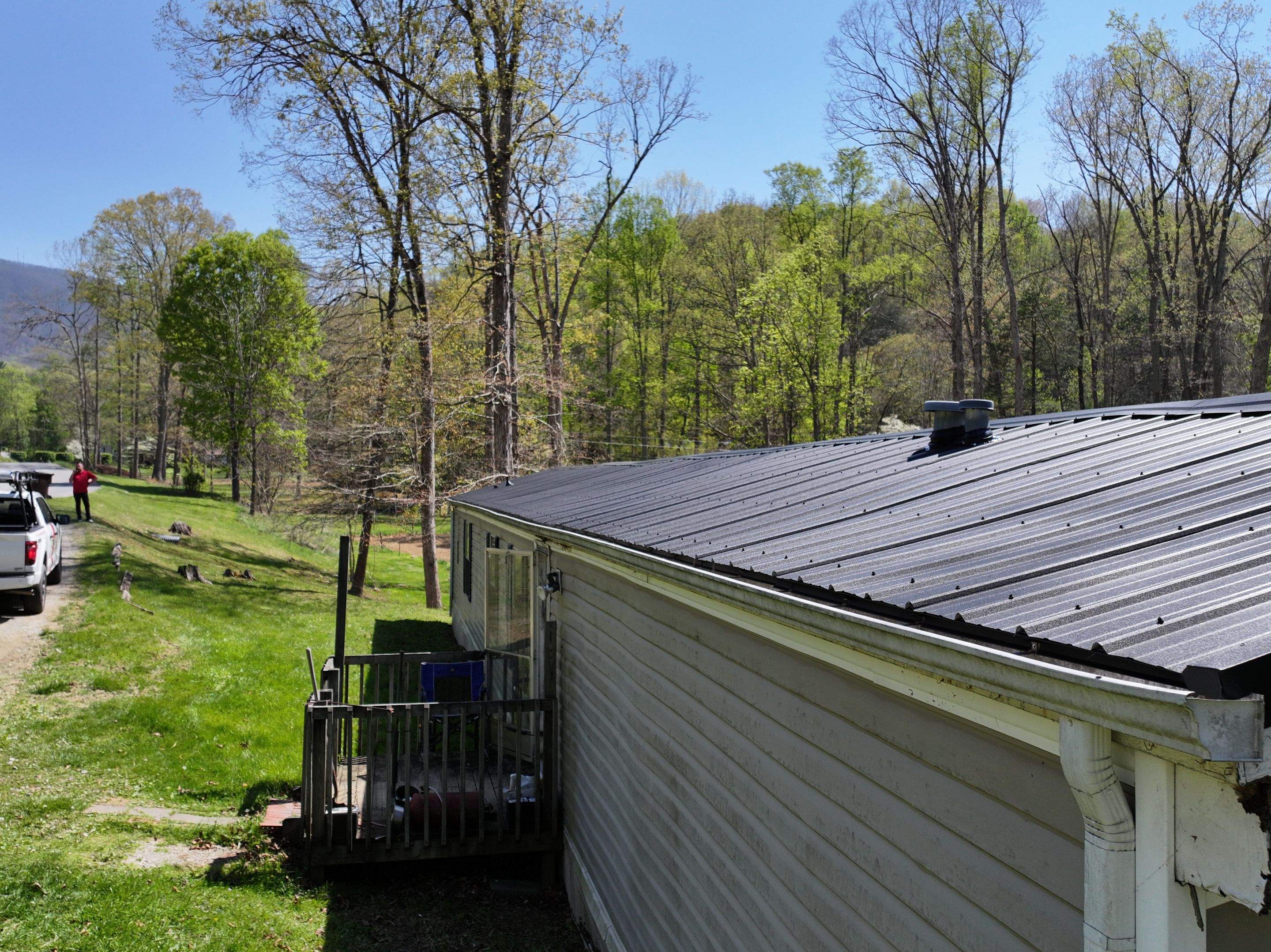 Residential Roofing Installation using 29 Gauge AG Panel by Omnia Roofing