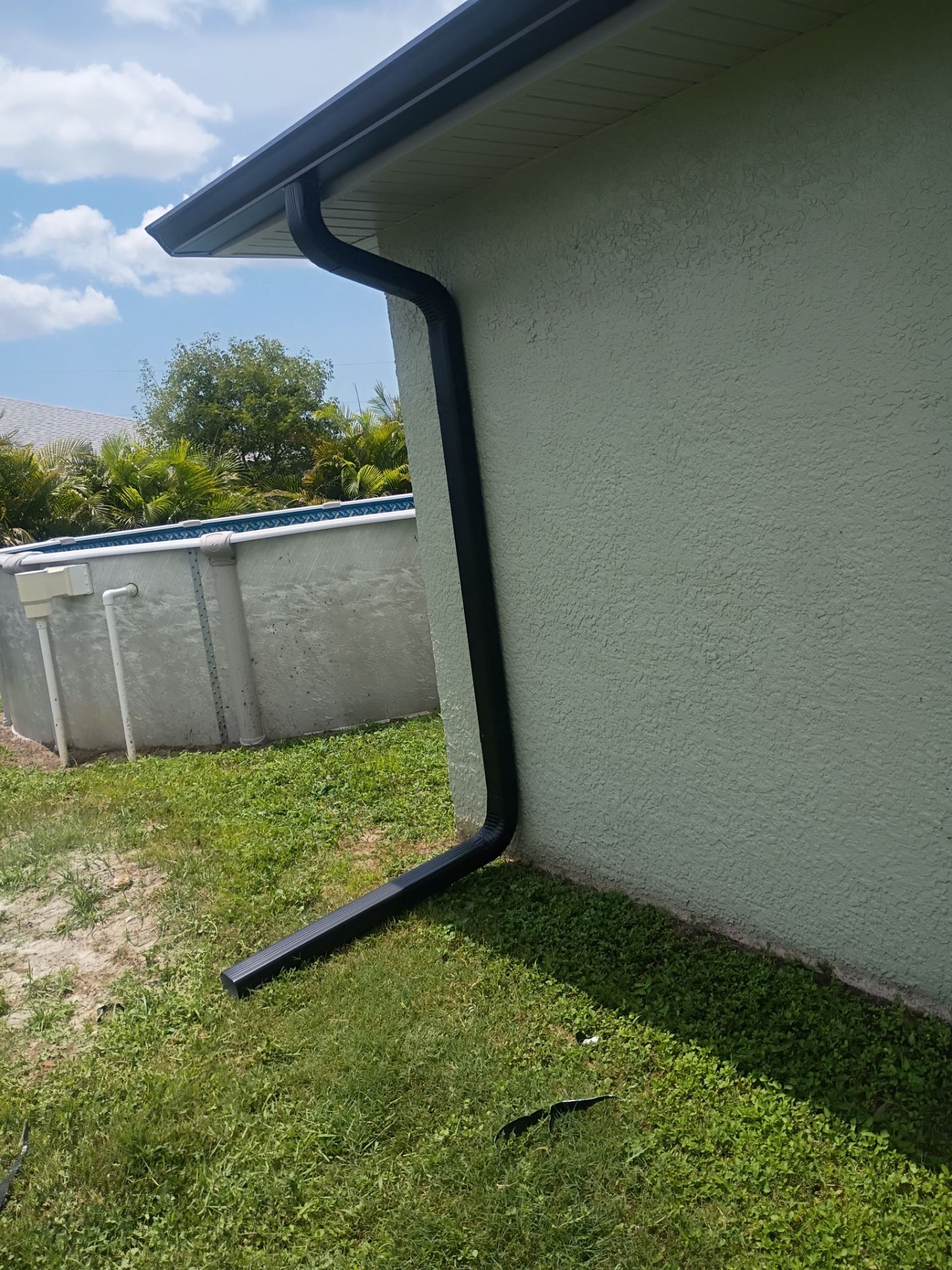 Black Seamless Gutters using K-Style Seamless Gutters in Cape Coral FL by Gutter Professors