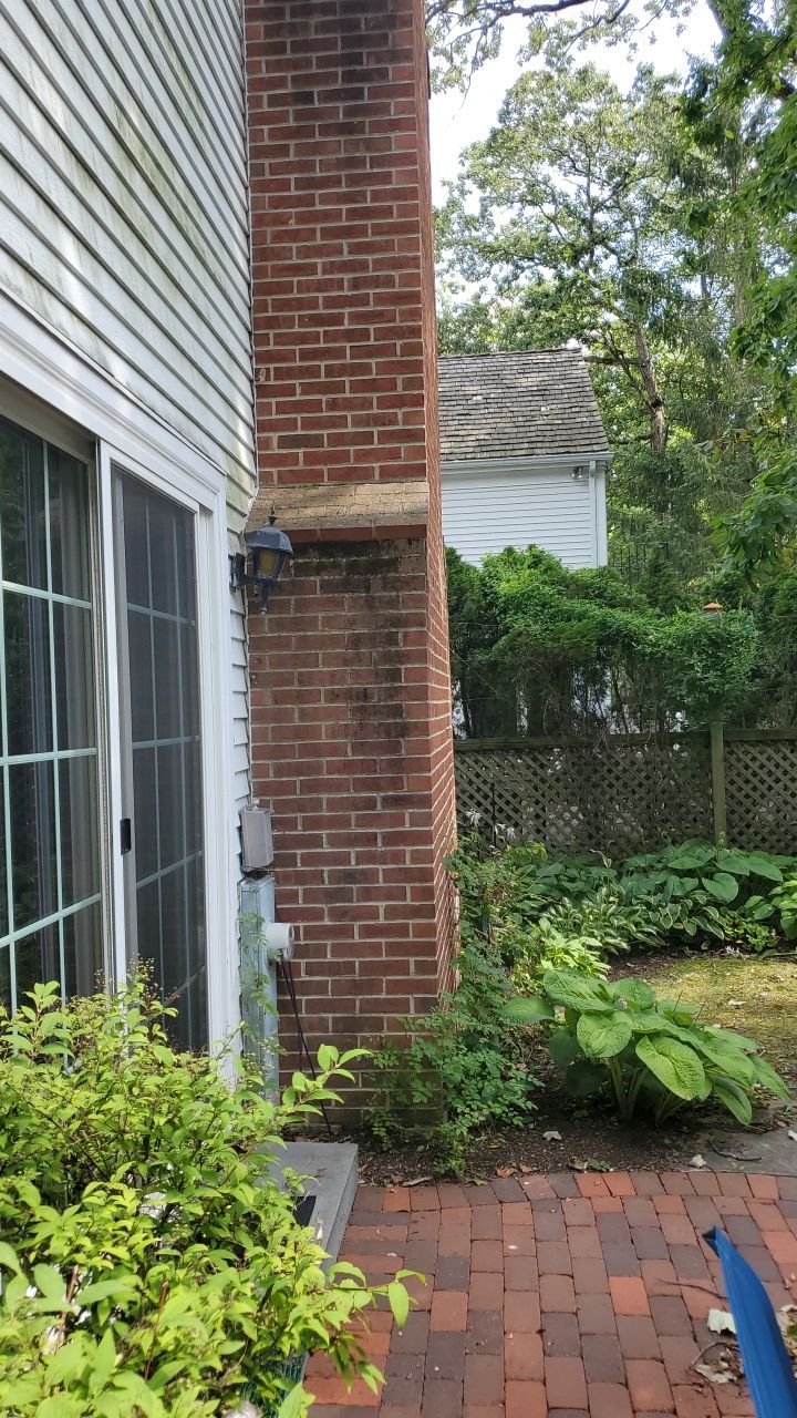 Housewashing  using Algaecide, soft wash soap by Northern Power Washing LLC.