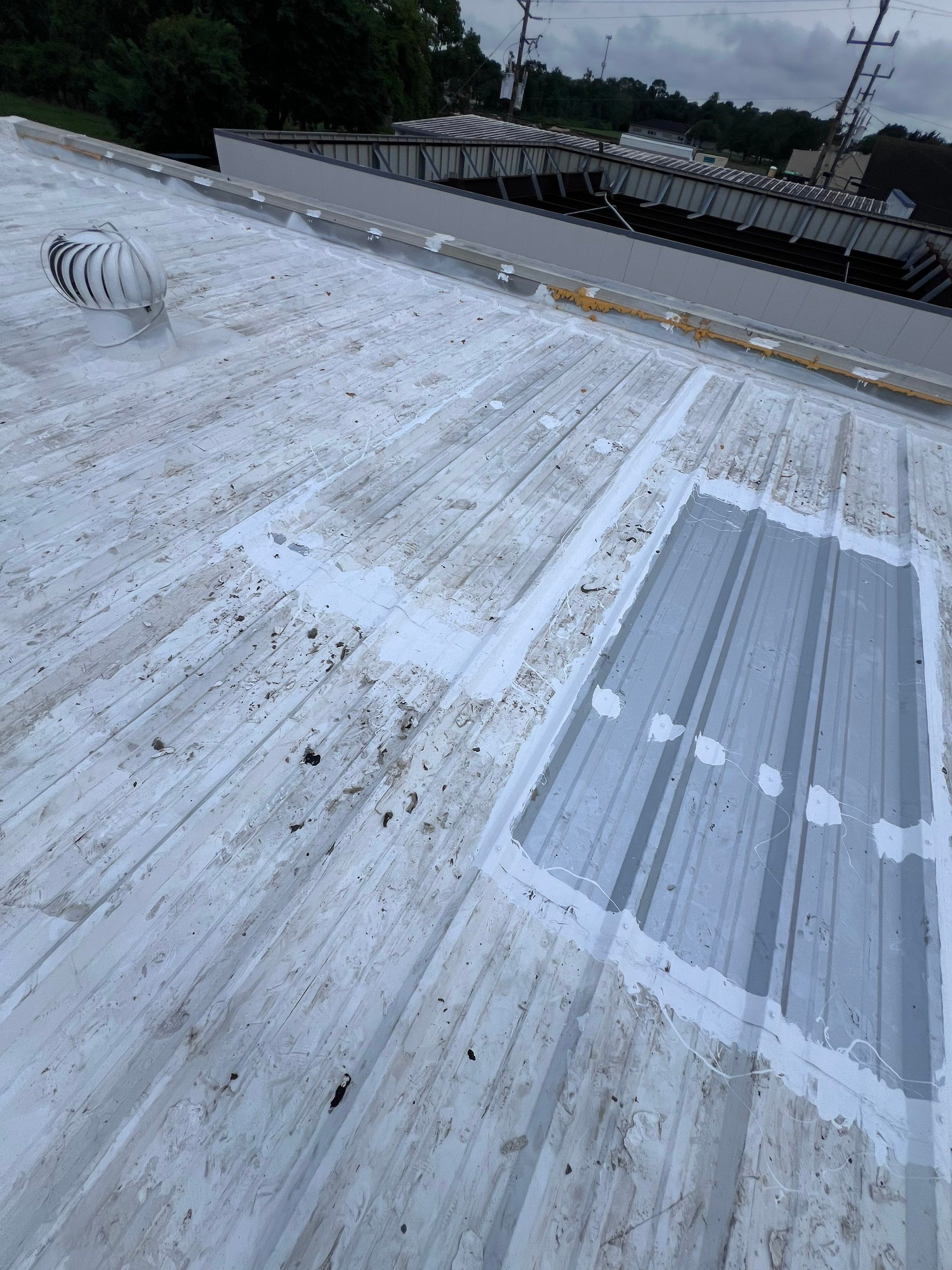 Commercial Roofing Repair using Metal by Roof Repair Company