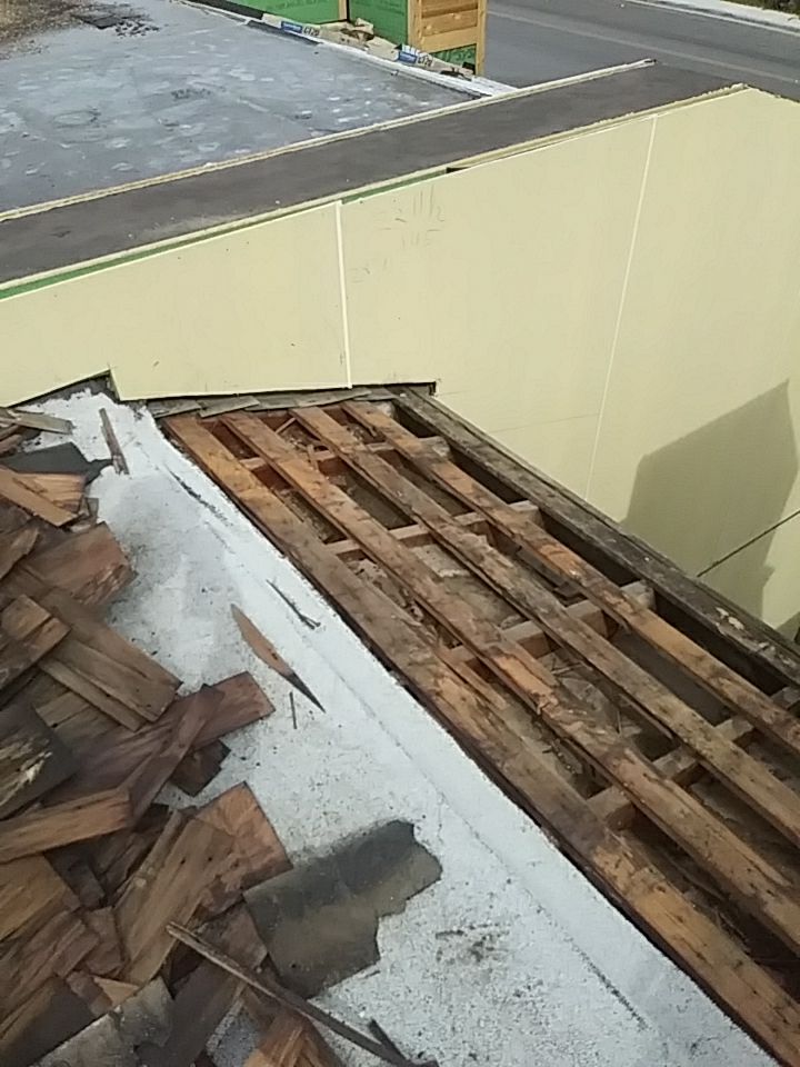 Apartment Roof Replacement by First Out Roofing 