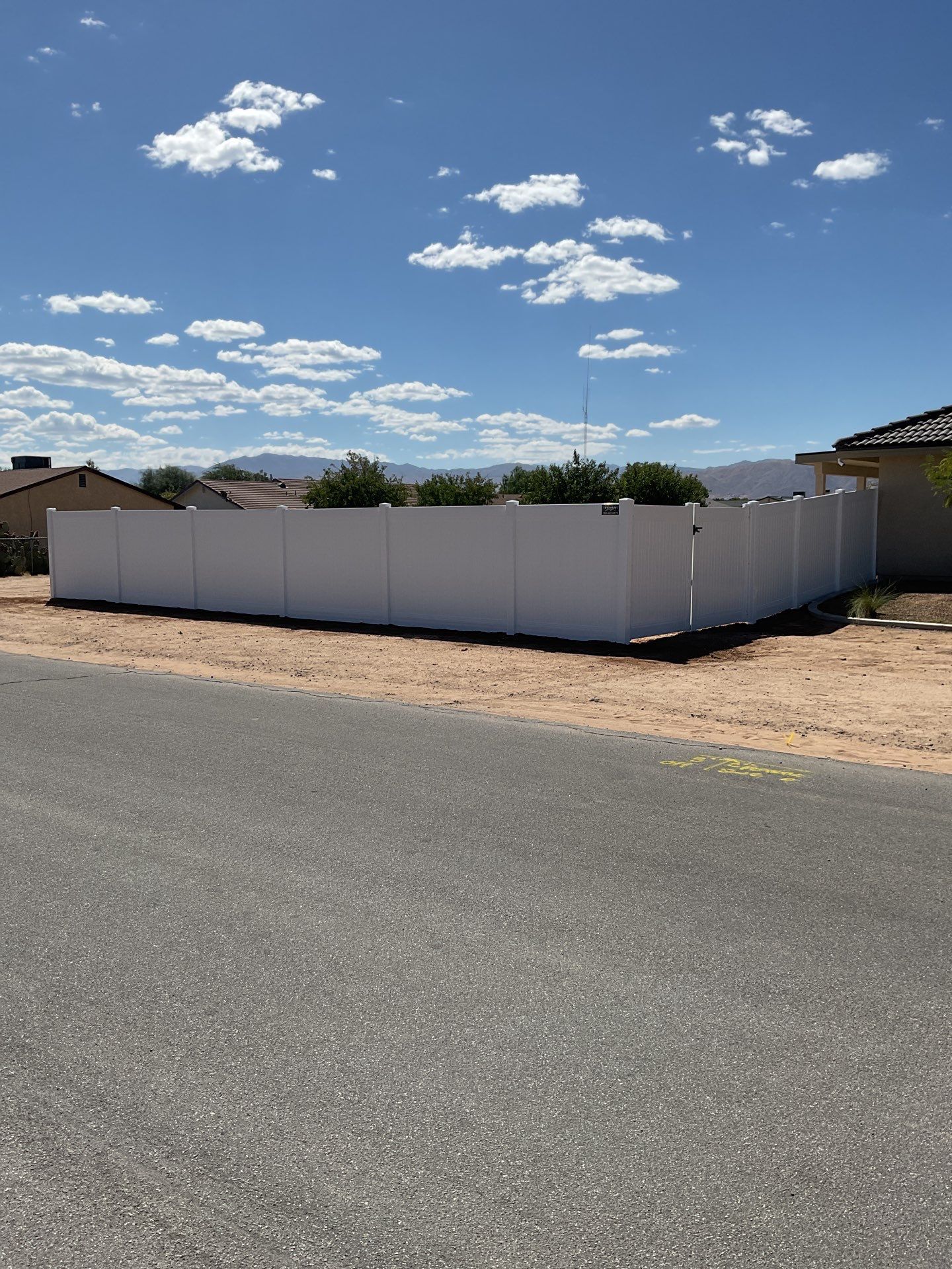 6ft White Privacy Vinyl Fence with Chain-link Fence by Fence Guys Inc.