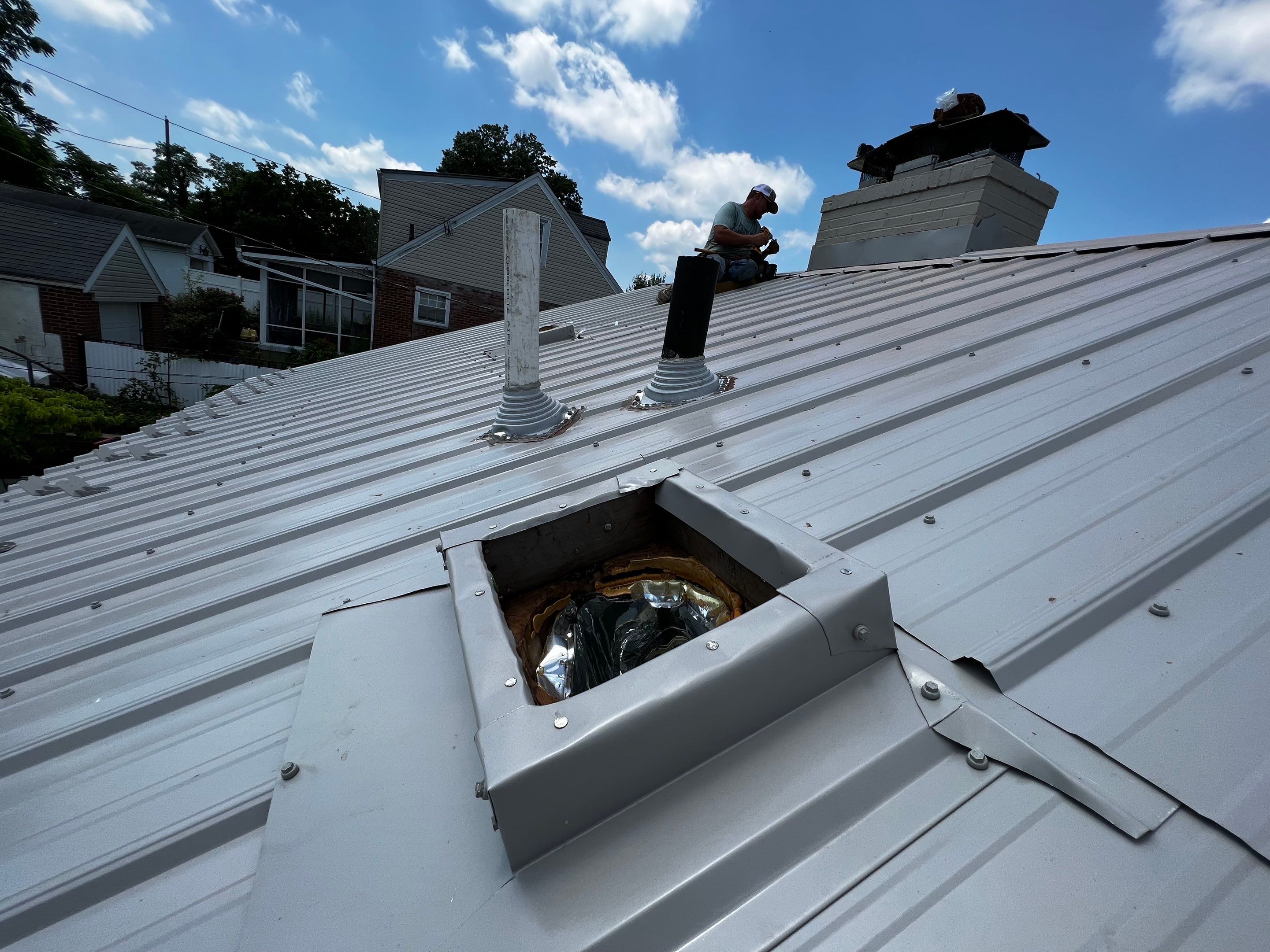 Metal Roofing, Skylights, Porch Build by Secure Construction Company Inc