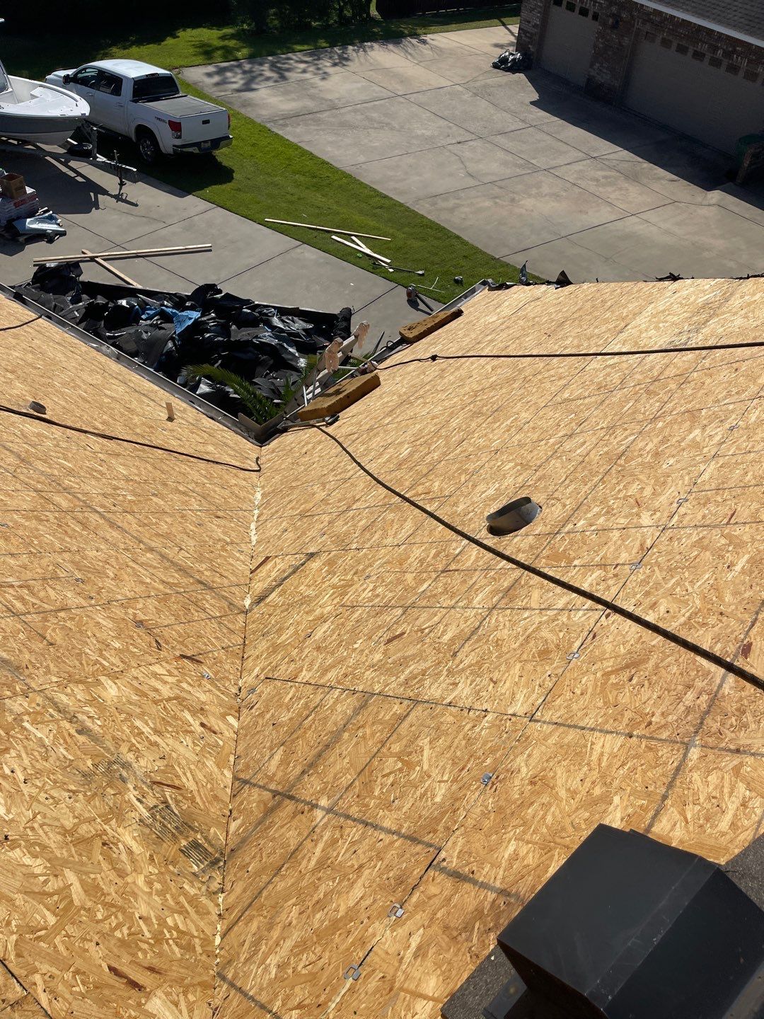 Residential Roofing Installation using Roof Replacement by American Roofing & Construction LLC