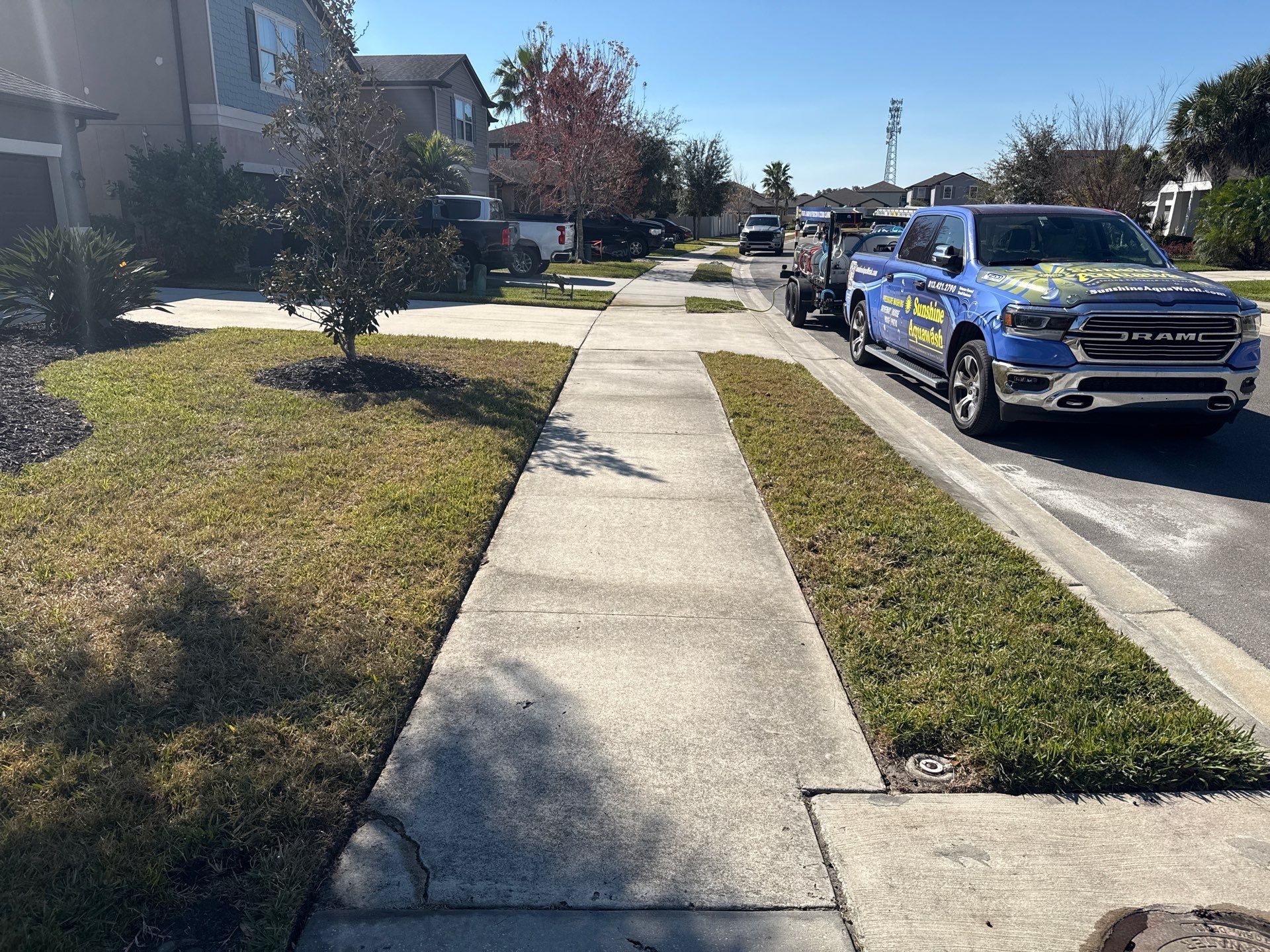 2-Car Concrete Driveway & Sidewalk Cleaning in Trevesta – Palmetto, FL by Sunshine AquaWash