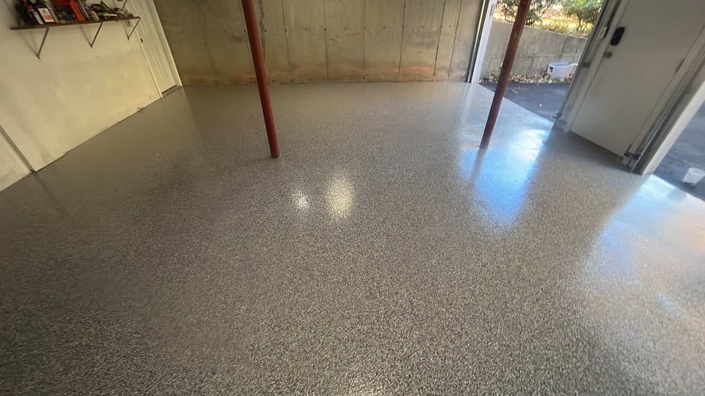 Garage in Londonderry, NH 03053 by Symphony Concrete Coatings