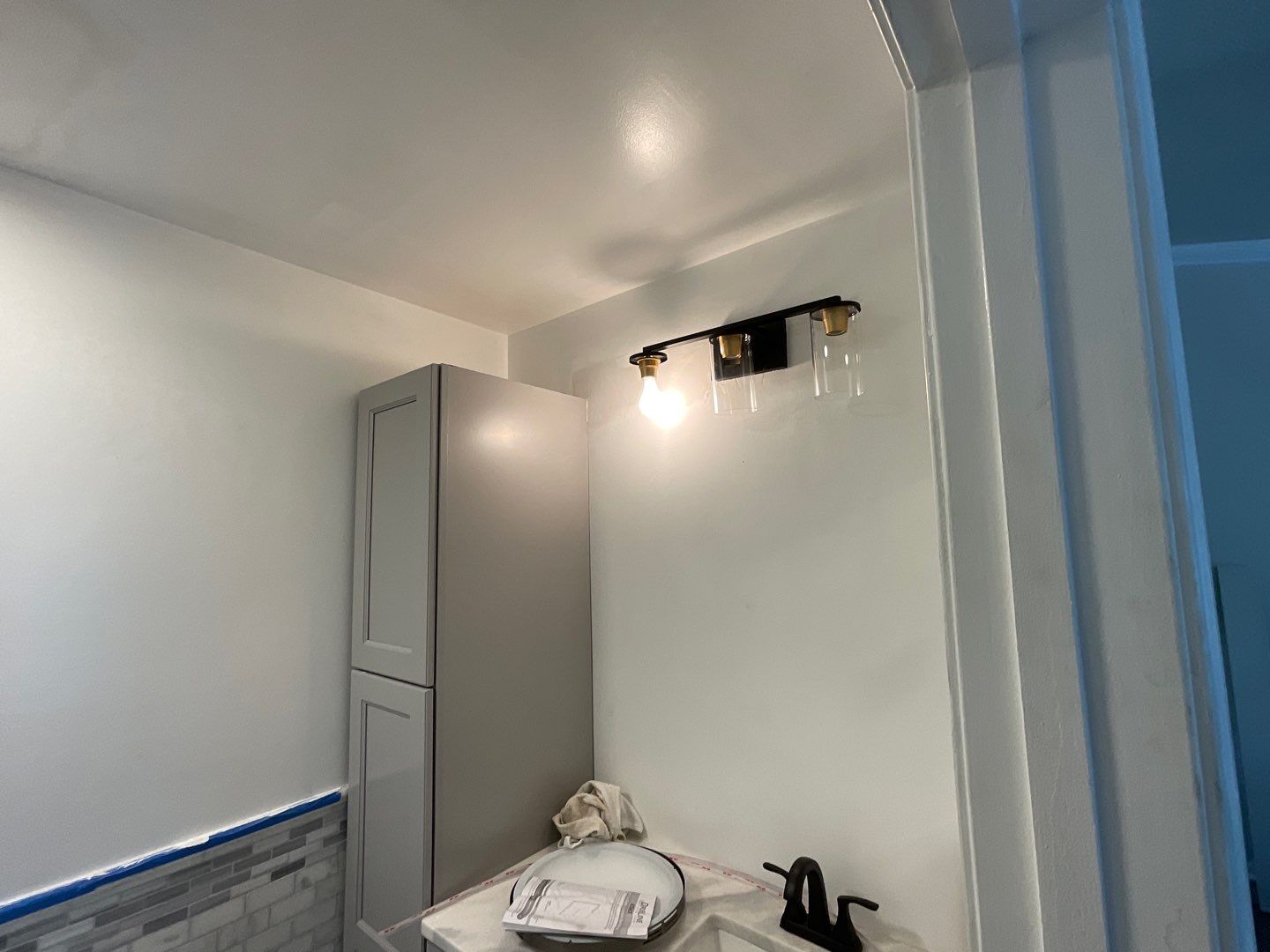 Bathroom Remodel using Two new bathroom design and new floors by Alpha Design Services