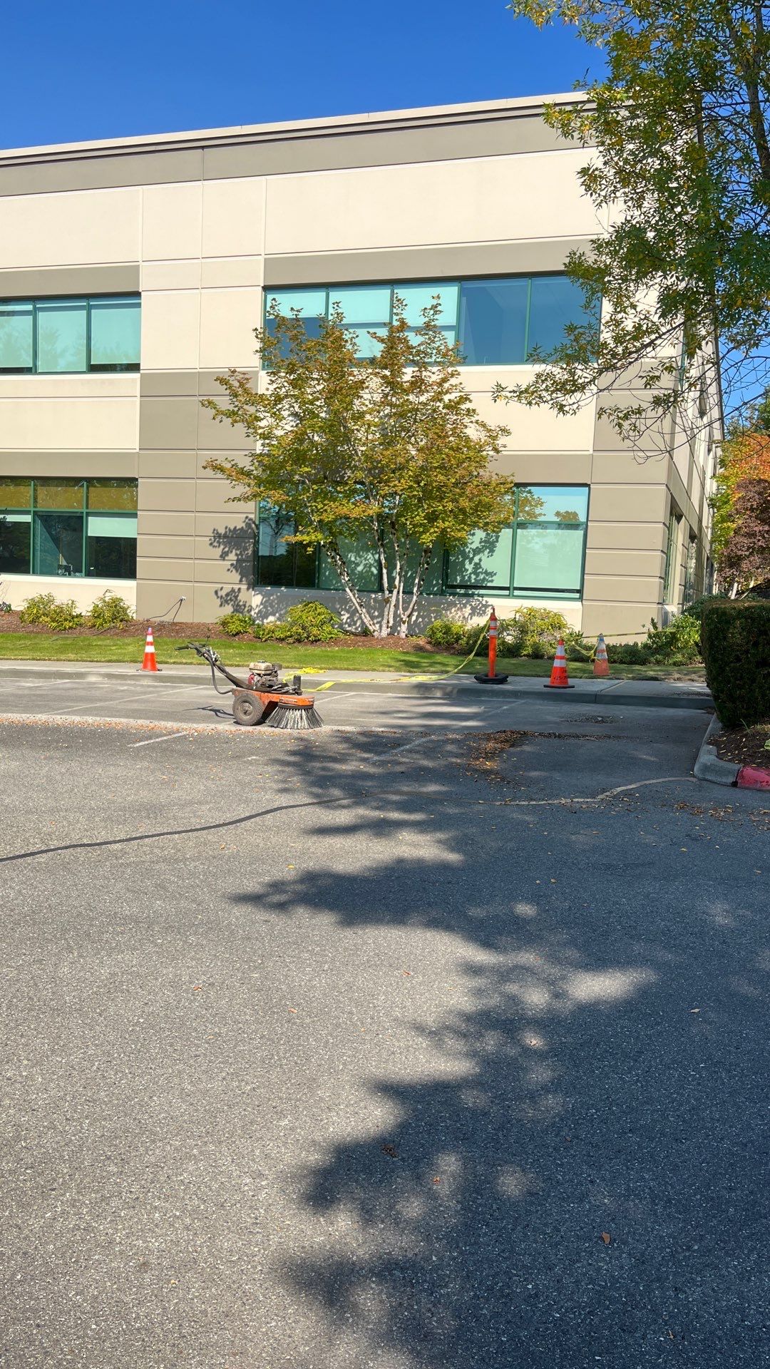 Kidder Matthews | Parking Lot Sealcoating & Striping with Concrete Curb & Patch Repairs  by Jireh Asphalt & Concrete Inc 