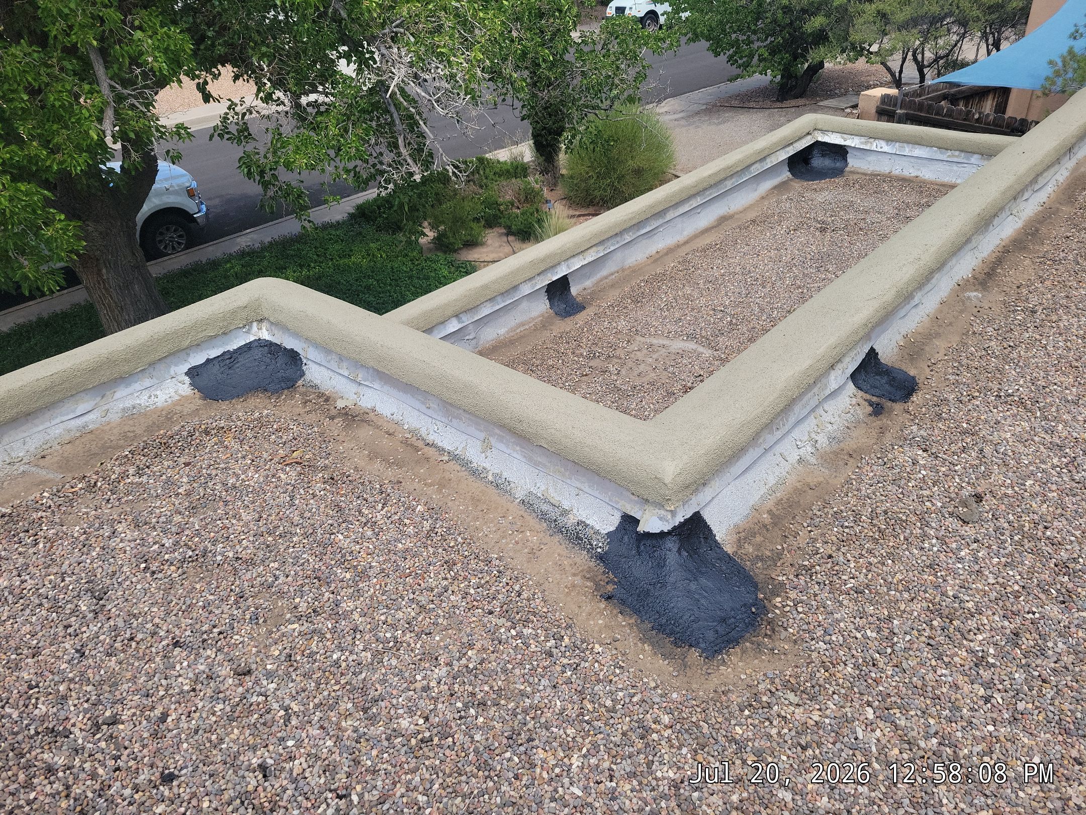 Tar and Gravel Roof Maintenance and Penetration Sealing in Albuquerque by Doyle Roof Masters Inc