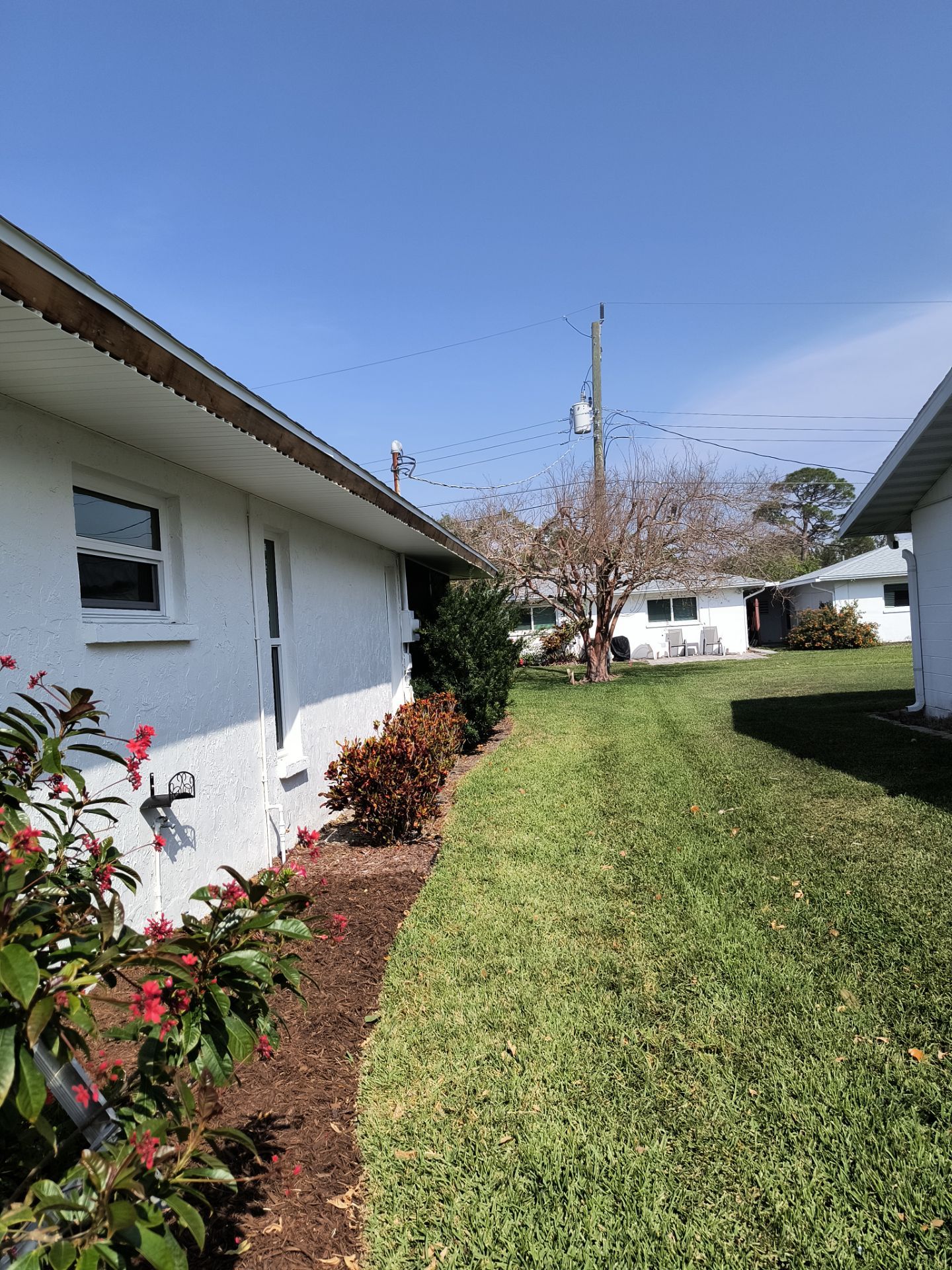 Aluminum White Soffit Installation in Sarasota FL by Gutter Professors