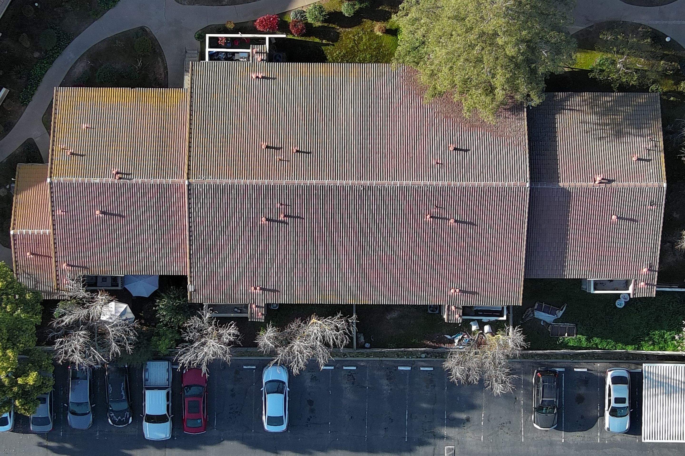 Removed tile from roof and replaced with shingles by Straight Edge Roofing Inc