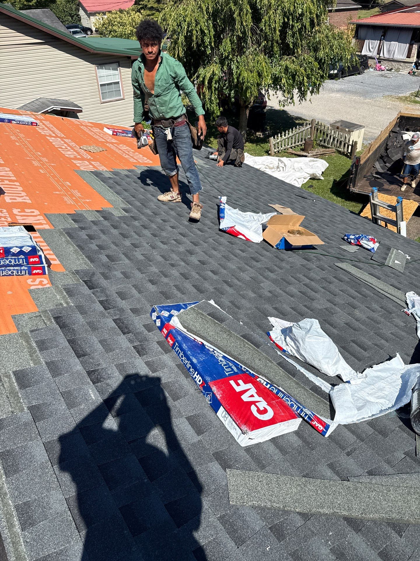 Residential Roofing Installation using GAF Timberline HDZ Charcoal by Rainstoppers Roofing