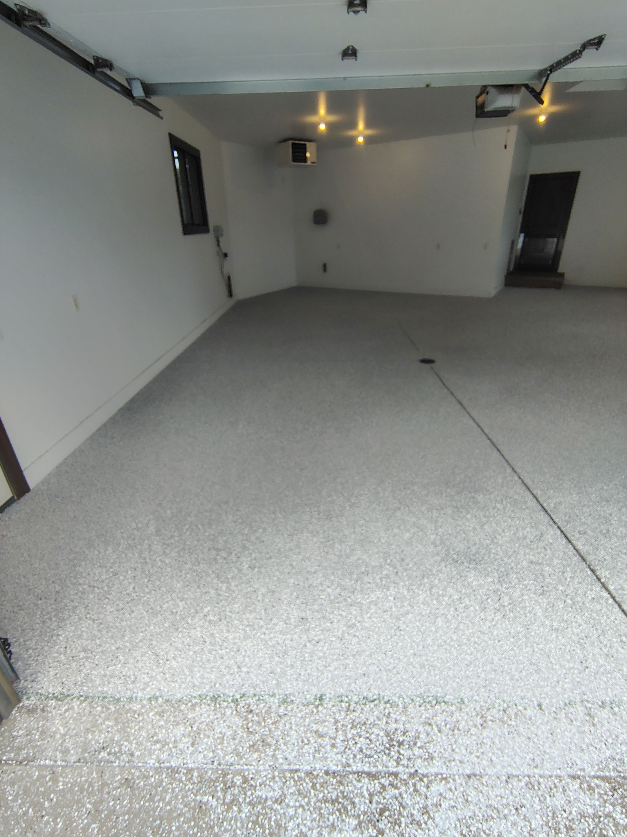 Feather Grey Floor Coating in Sioux Falls, SD by Select Painting, Coatings & Garage Cabinets