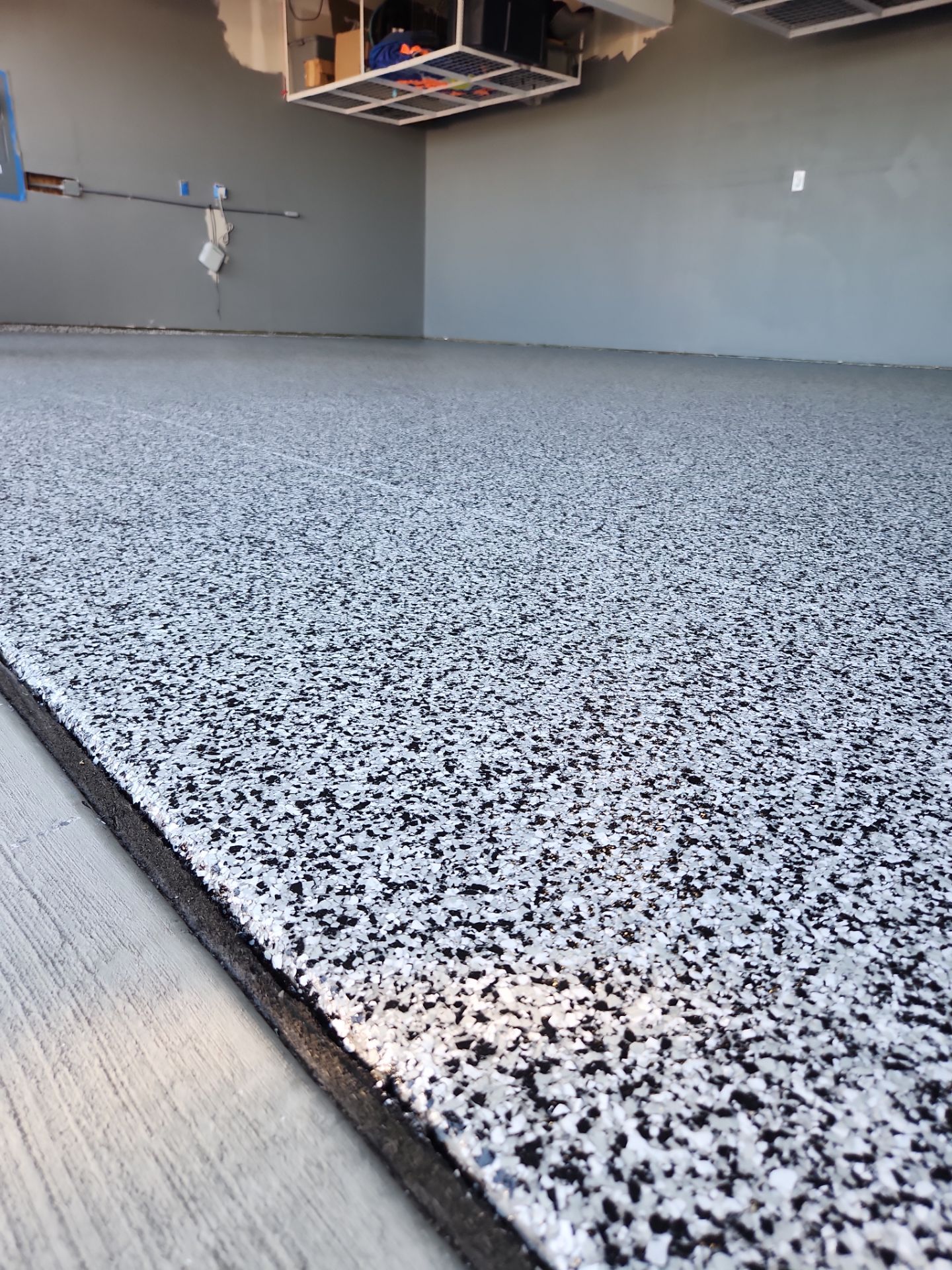 Garage Transformation using Domino by Croc Coatings, LLC