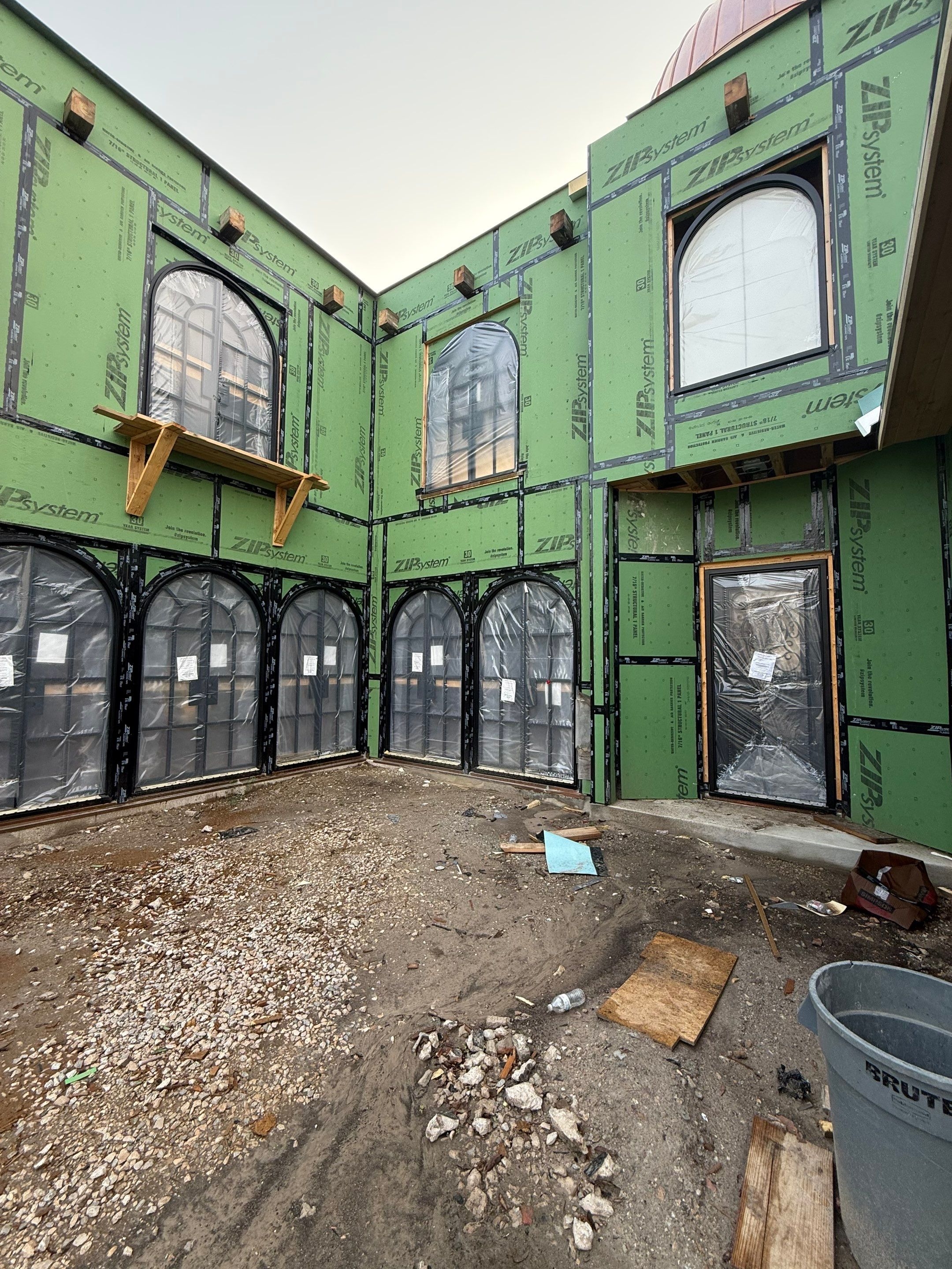 Arched Black Metal French Door Installation and Finishing in Fort Worth by Solara Custom Living