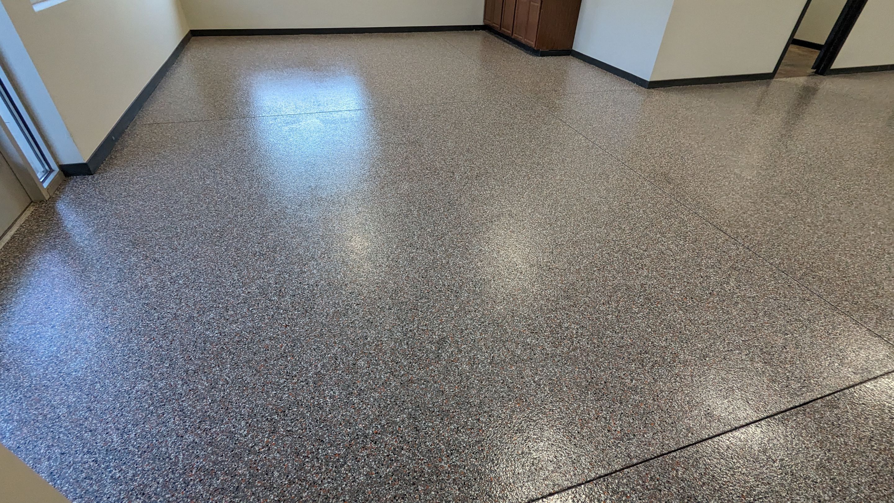 Equipment Share Commercial Floor Transformation using Smoke w/ 5% Orange by Croc Coatings, LLC