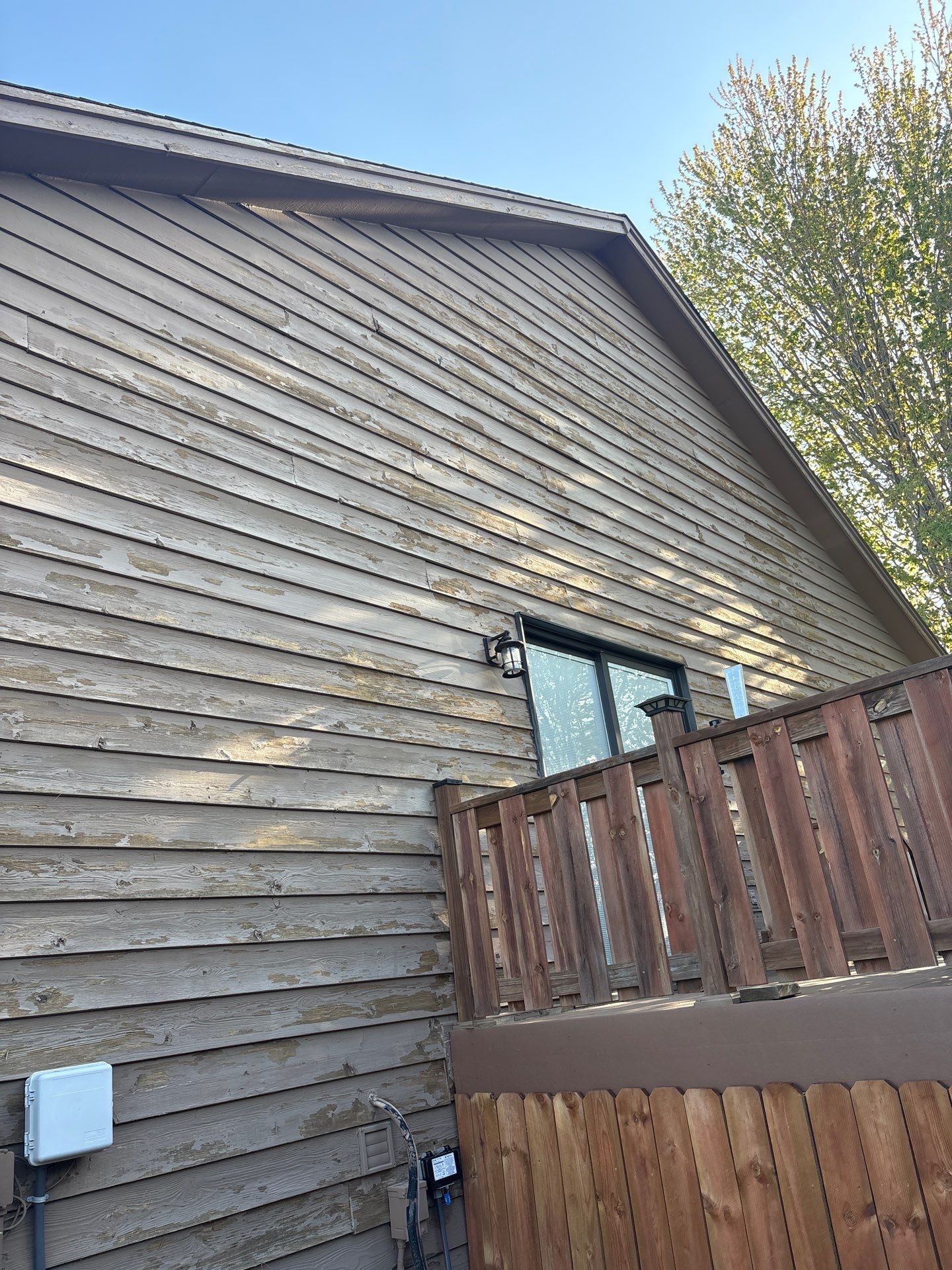 Wood Siding Restoration and Exterior Painting in Sioux Falls by Select Painting, Coatings & Garage Cabinets