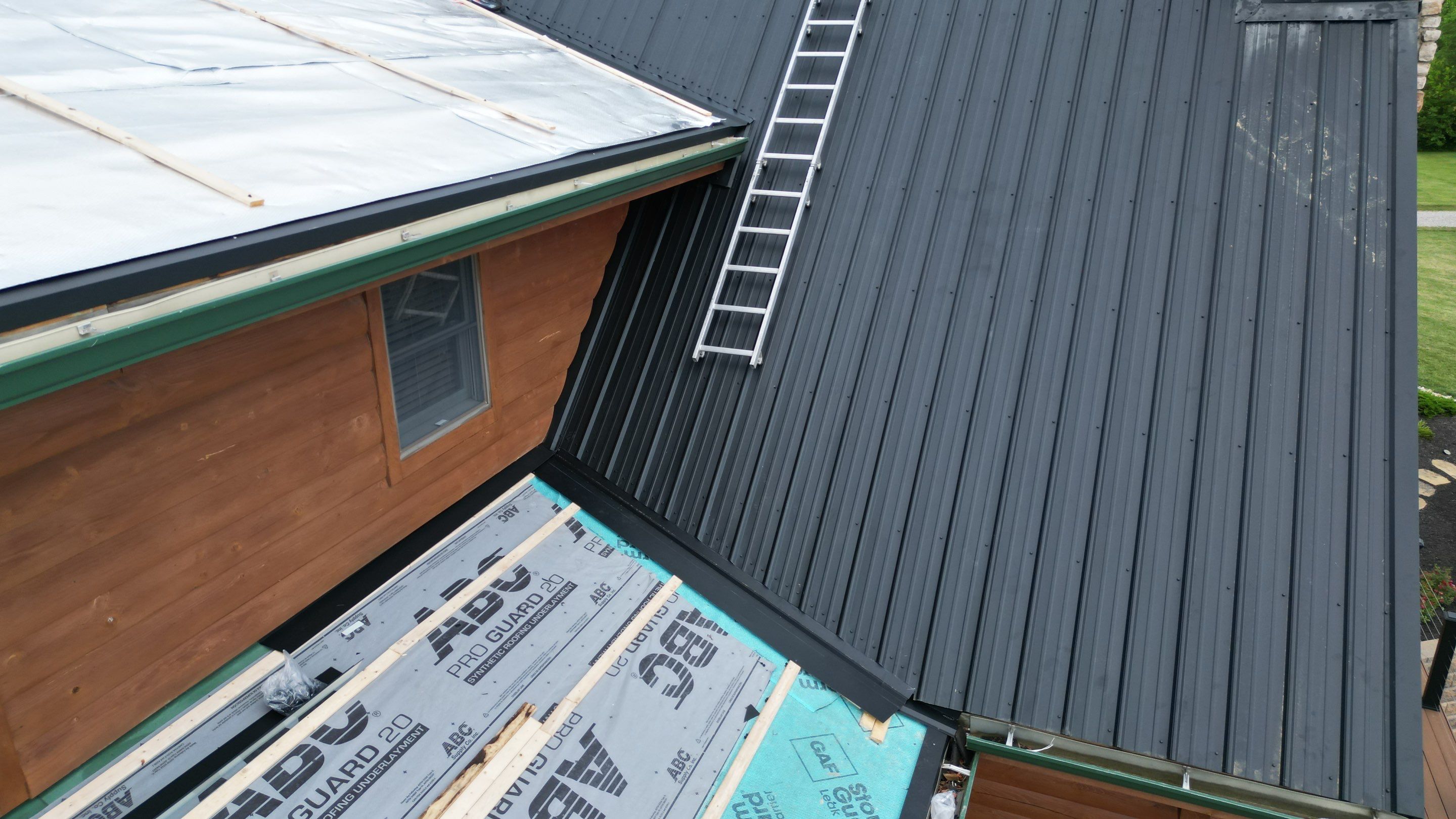 Residential Roofing Installation using Performance Panel Metal - Frost Black by RoofX 