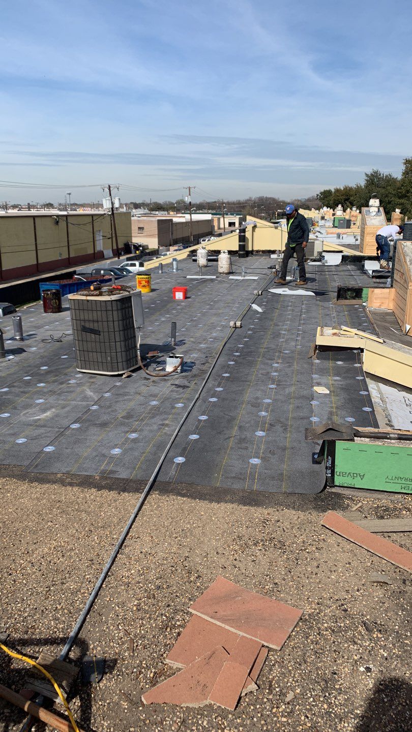 Apartment Roof Replacement by First Out Roofing 