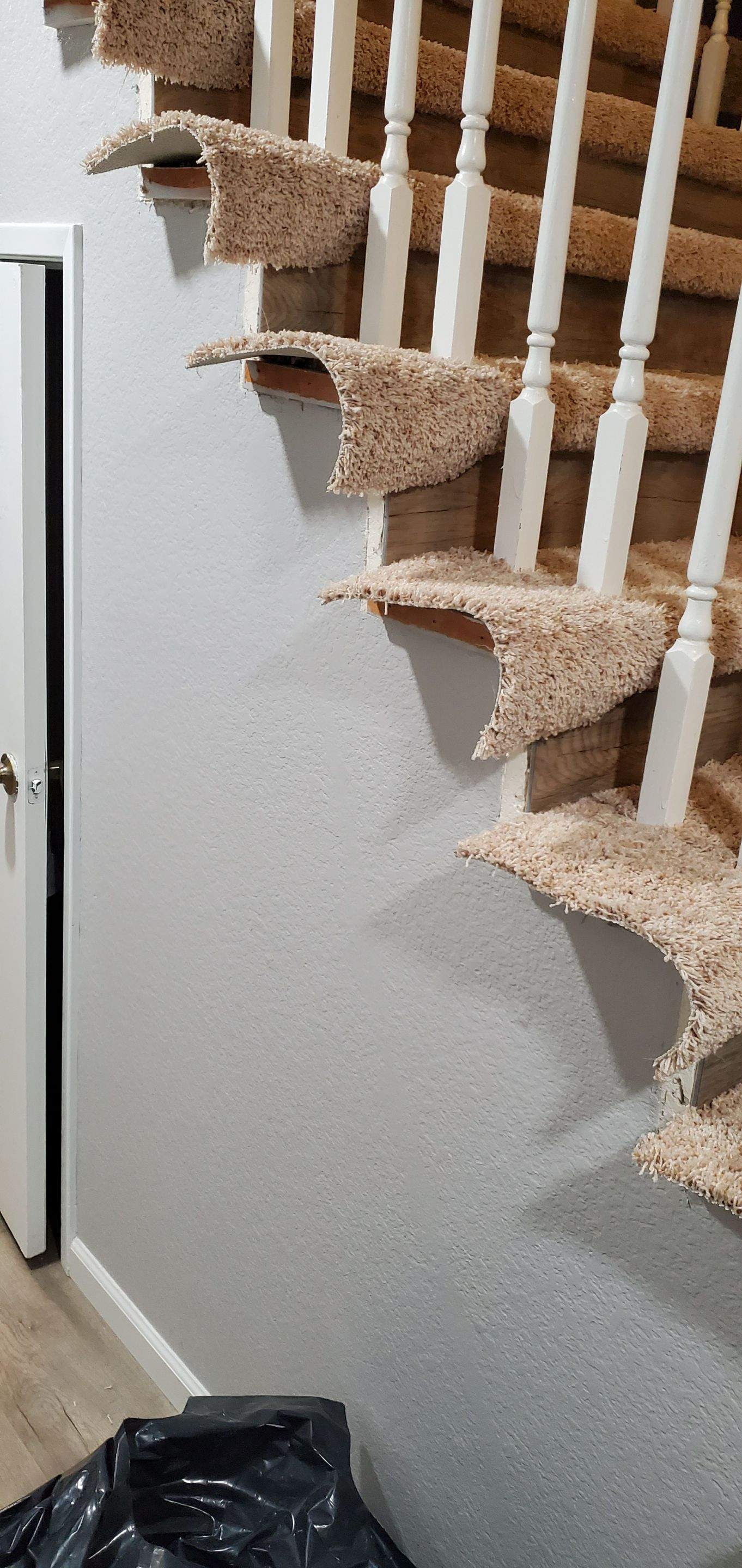 Carpet Install on Stairs with Spindles by Ardent Carpet Restore LLC