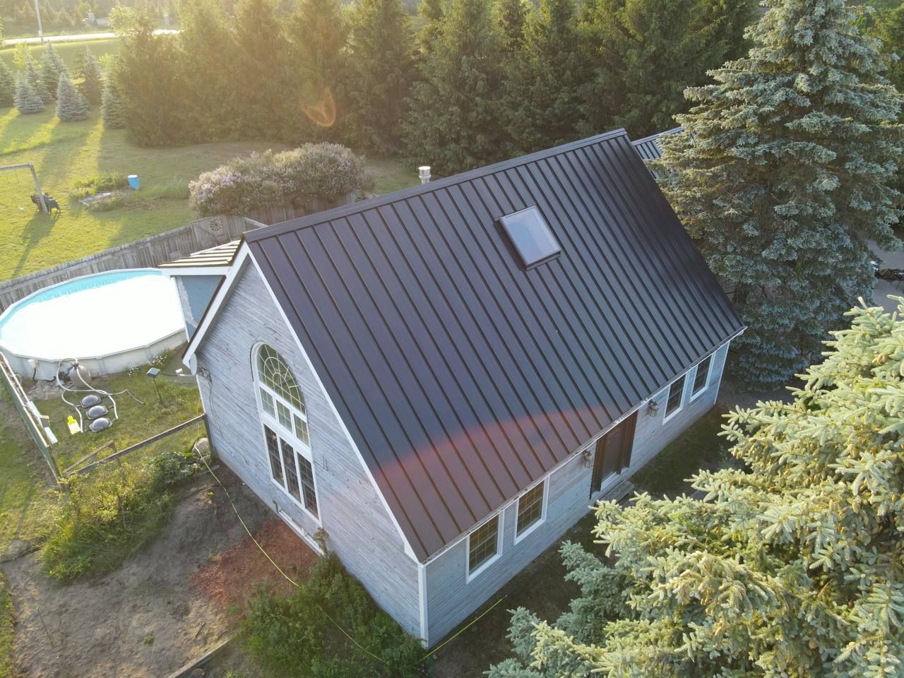 Residential Roofing Installation using 24 Ga Standing Seam Metal  by Jay Carter Roofing & Sheet Metal