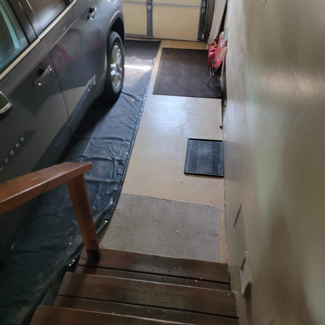 Full Garage and Basement Epoxy Floor Coating in Winner by Select Painting, Coatings & Garage Cabinets