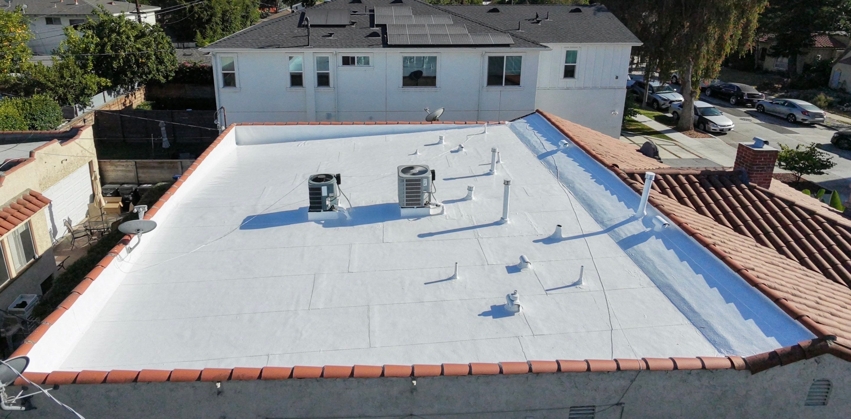 Los Angeles Flat Roof Restoration with White Reflective Coating by Hull Brothers Roofing