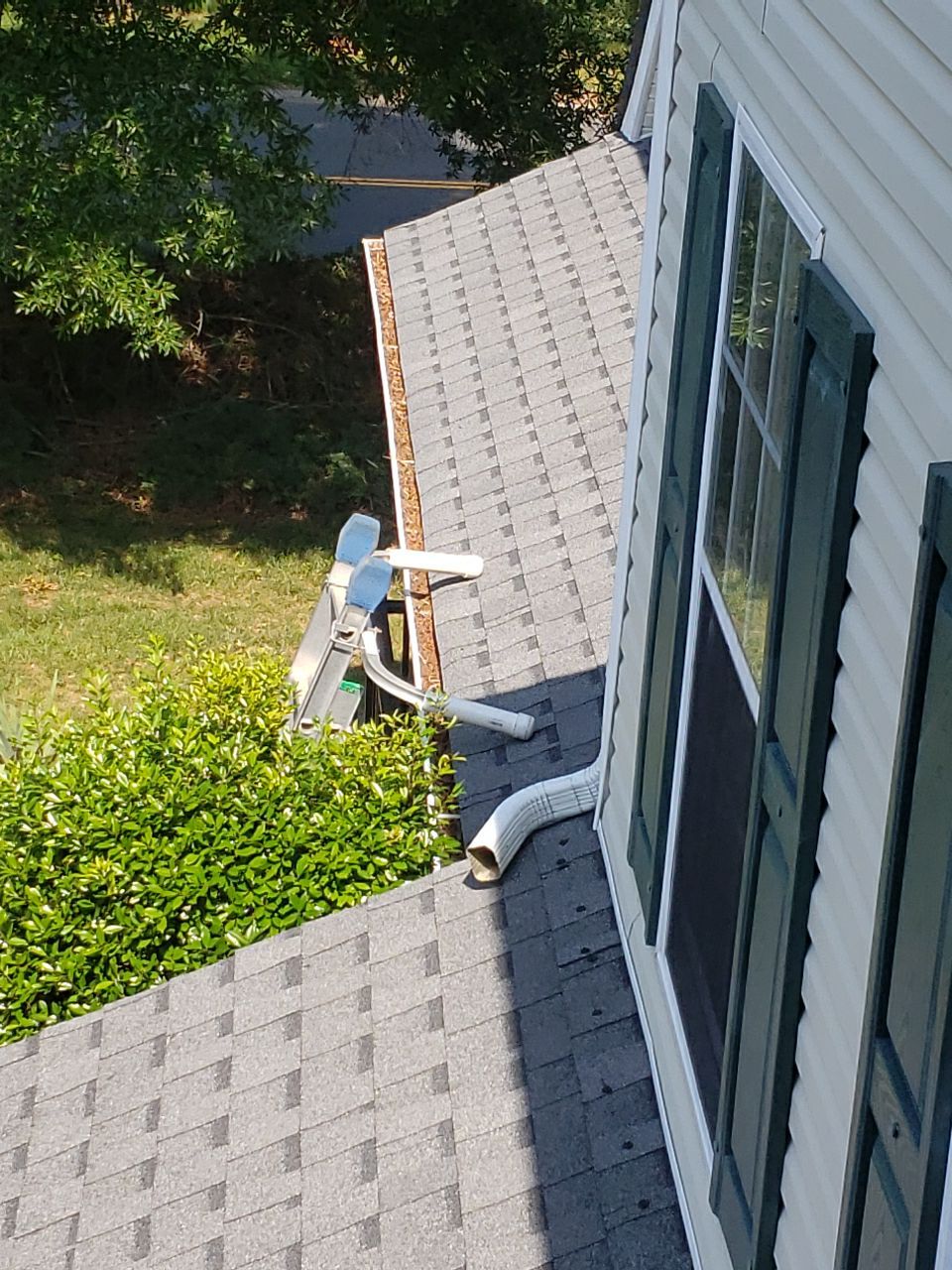Gutter Cleaning using water by Power Wash Masters LLC