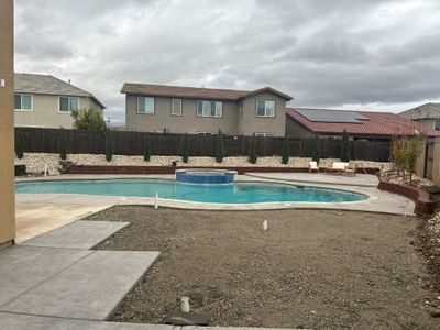 New Pool and Spa with Iridescent Blue Tile in Roseville