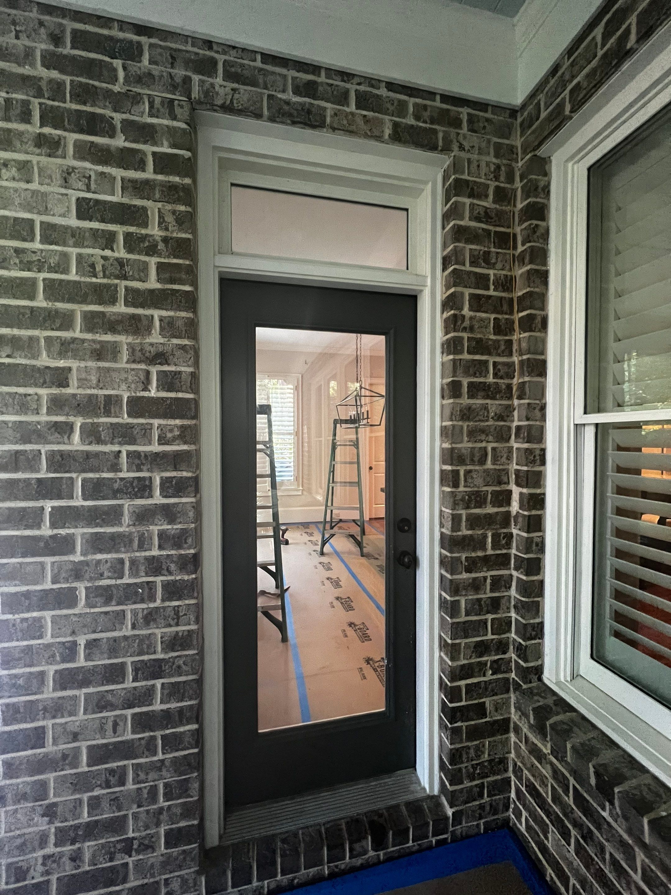 Atlanta French Door Installation with Custom Wood Overhang and Flagstone Patio by Swift Home Renovations