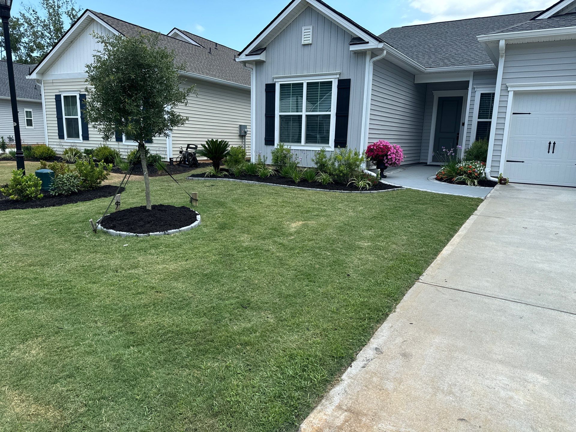 Custom Herringbone Paver Patio and Professional Landscaping in Bluffton by Lowcountry Scapes, LLC
