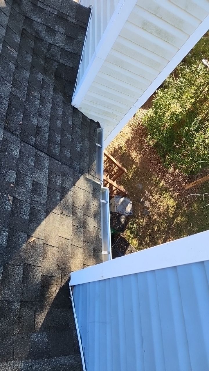 Gutter Cleaning using water by Power Wash Masters LLC
