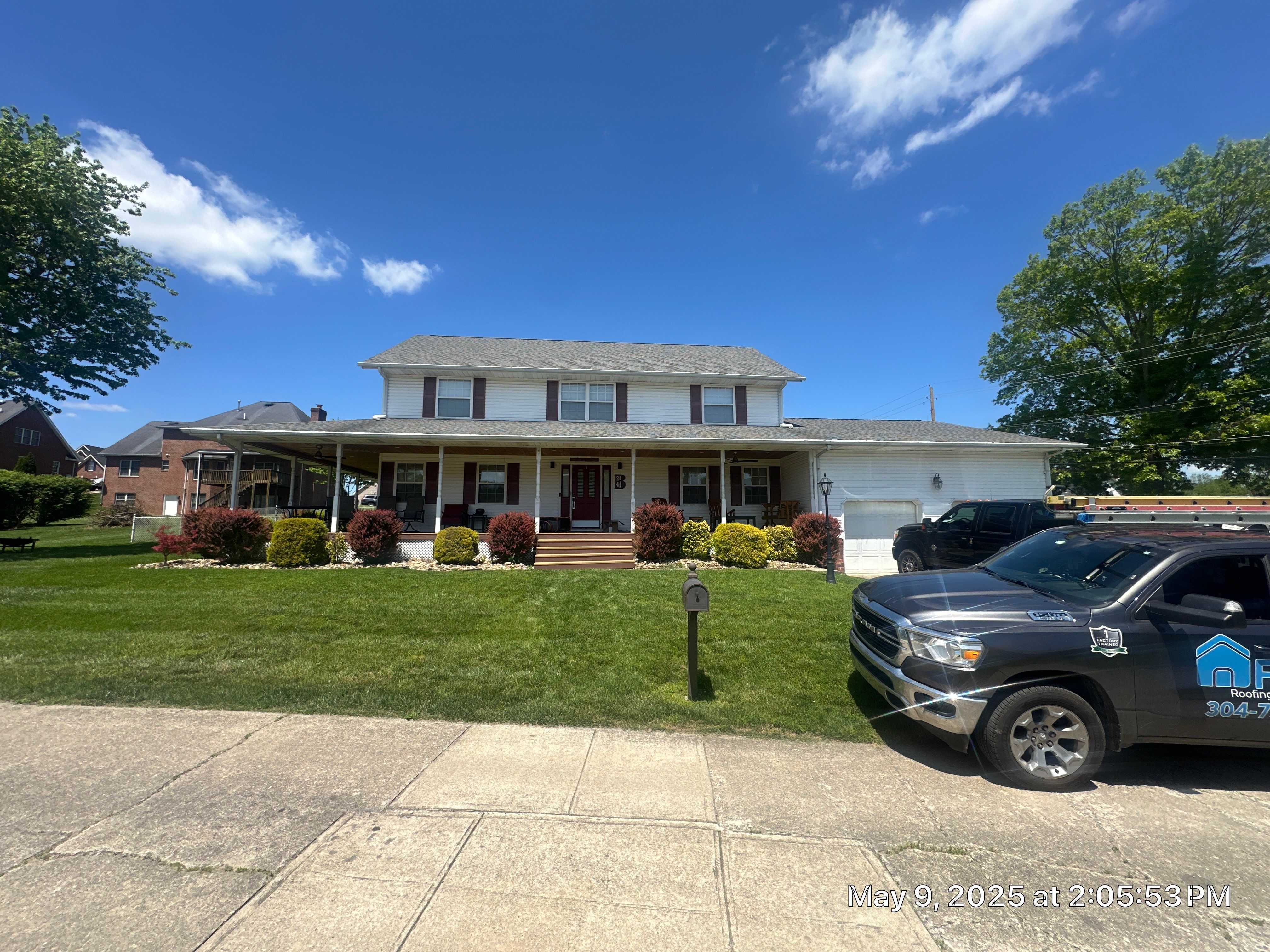 Siding and Metal Roof by Fahey Roofing + Contracting