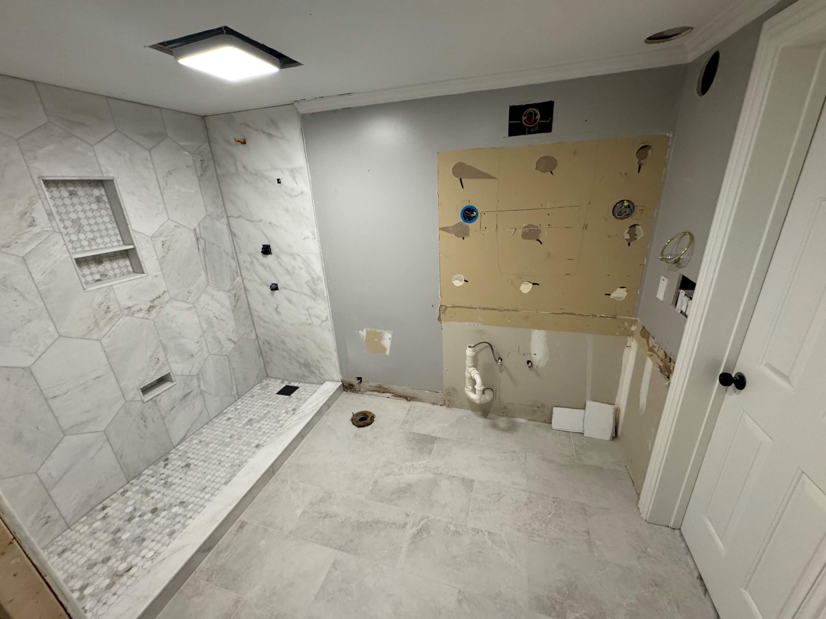 Basement bathroom renovation by Prudencio