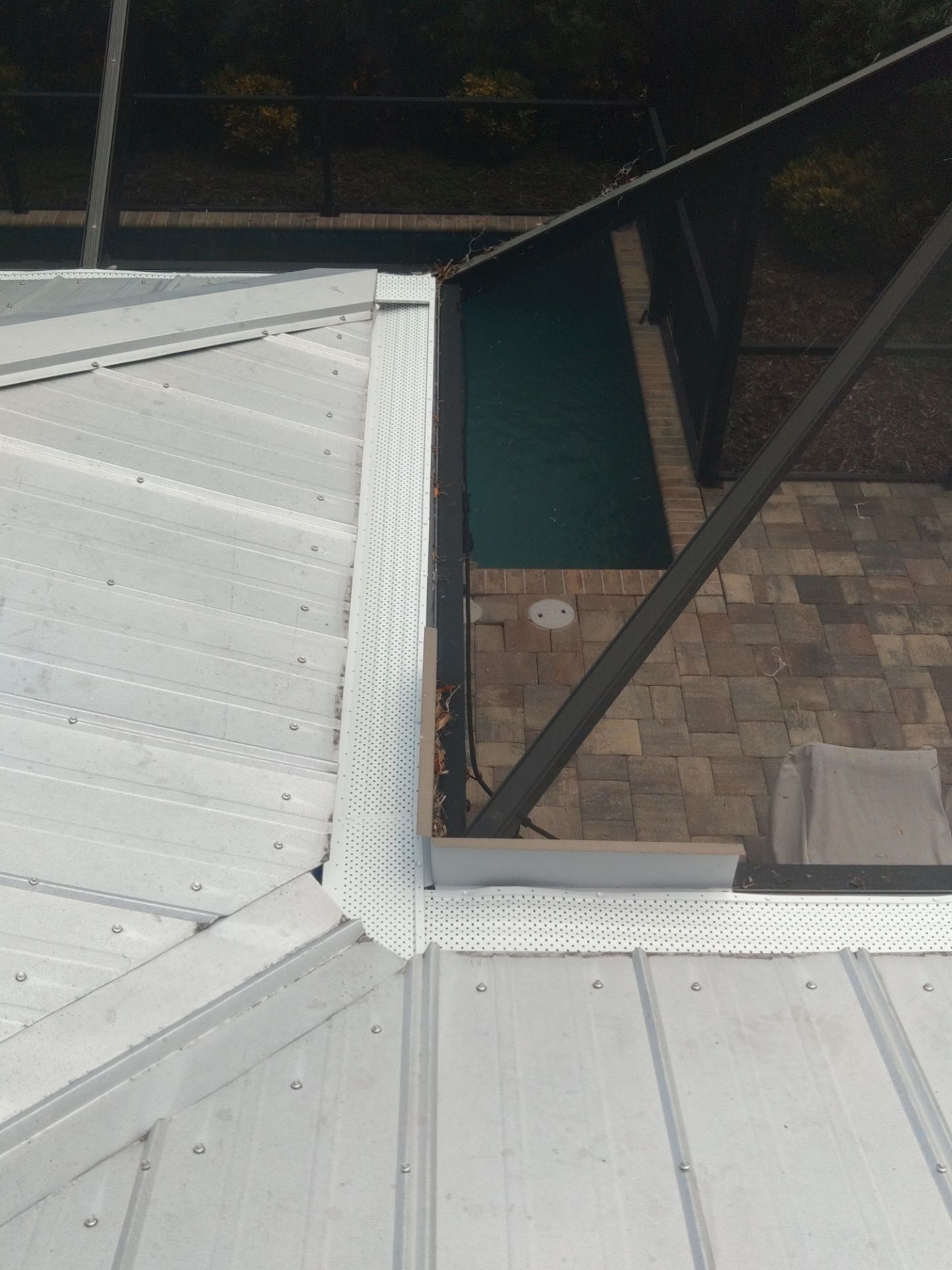 Gutter guards installation combined with gutter cleaning in Sarasota, FL by Gutter Professors