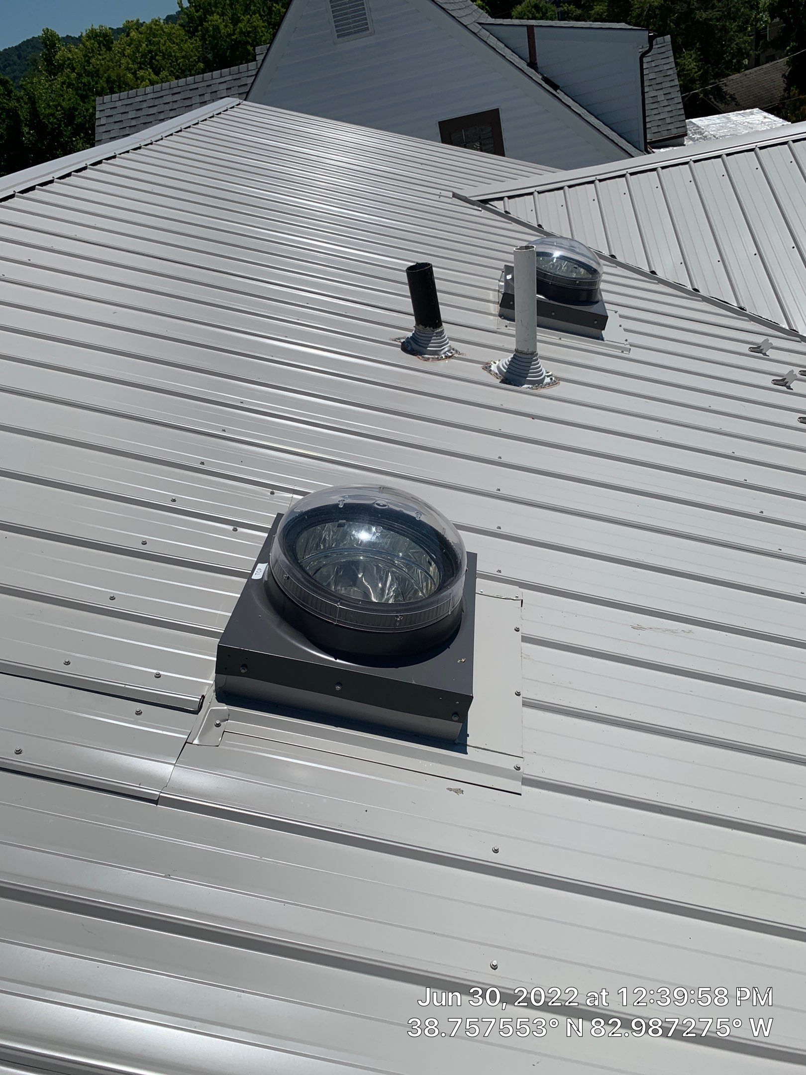 Metal Roofing, Skylights, Porch Build by Secure Construction Company Inc