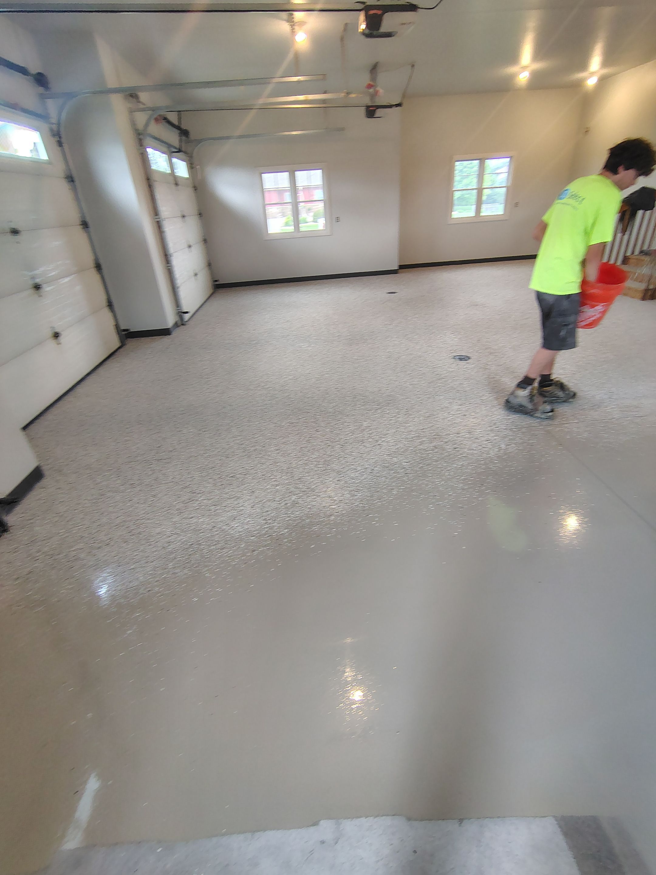 Multi-Car Garage Concrete Coating and Crack Repair in Dell Rapids by Select Painting, Coatings & Garage Cabinets