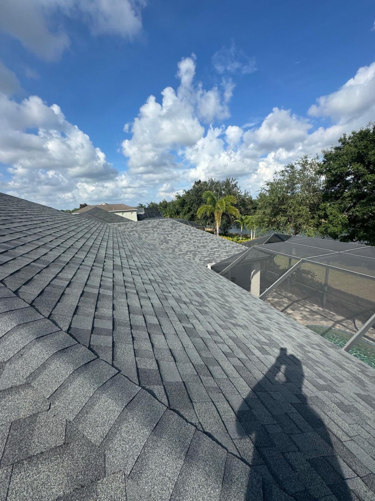 Residential Roof Installation With Estate Grey Architectural Shingles in Bradenton by Trinity Restoration and Roofing LLC