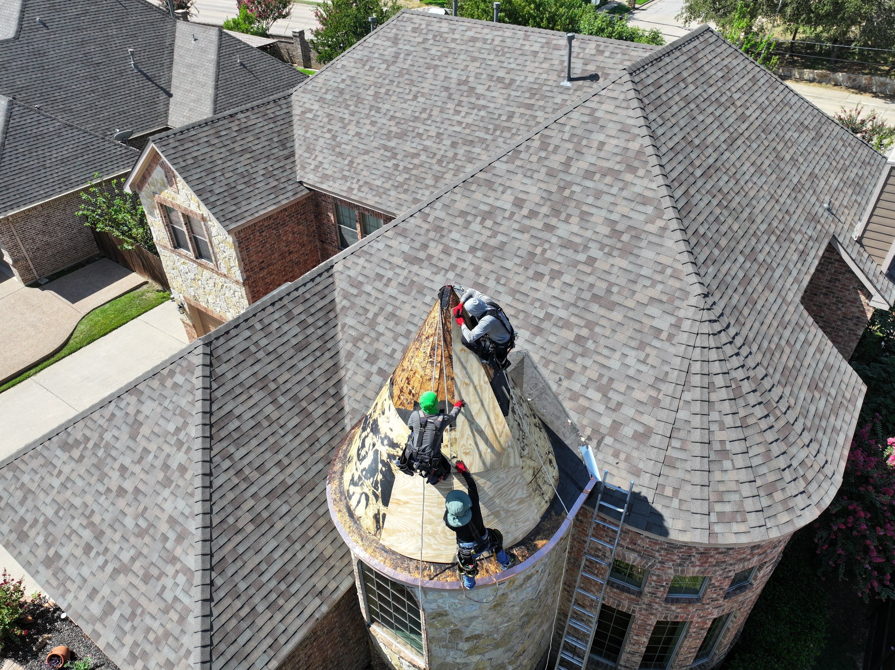 Installing Custom copper turret and Malarkey Vista Class 4 shingles Hail Damage Upgrade by Becker Roofing and Exteriors
