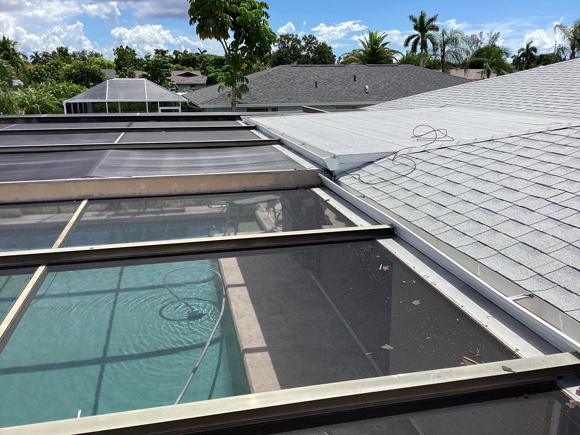 White Seamless Gutters and Splash Guards in Fort Myers FL by Gutter Professor by Gutter Professors