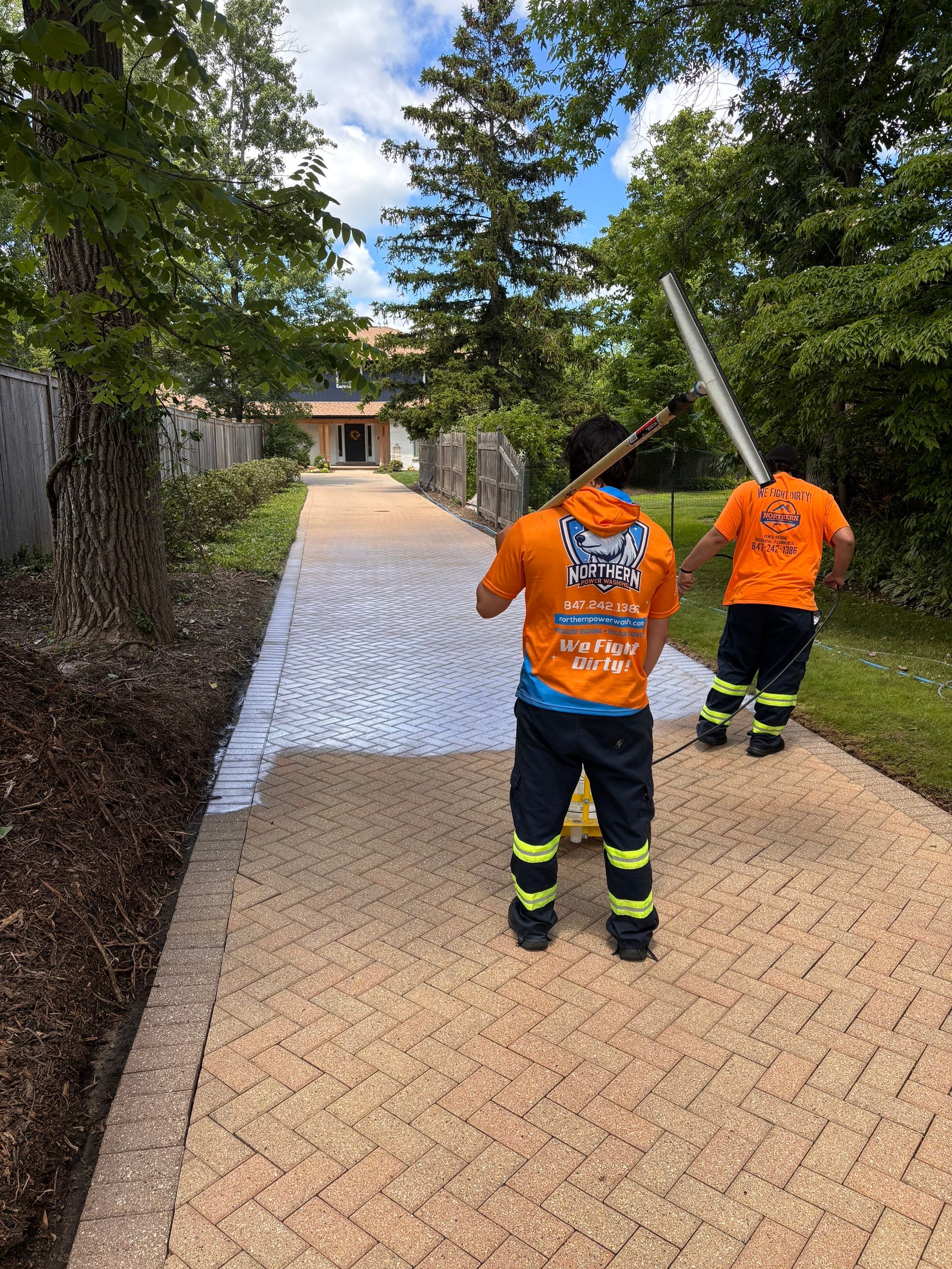 Brick paver repair, cleaning and sealing by Northern Power Washing LLC.