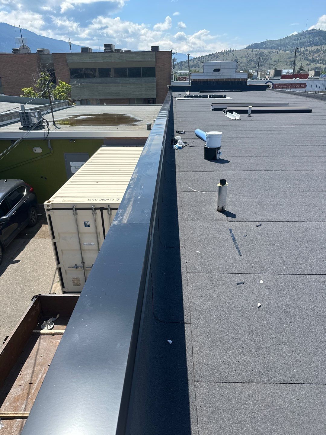 Commercial ReRoofing Installation using IKO 2ply sbs by Top Notch Roofing Inc