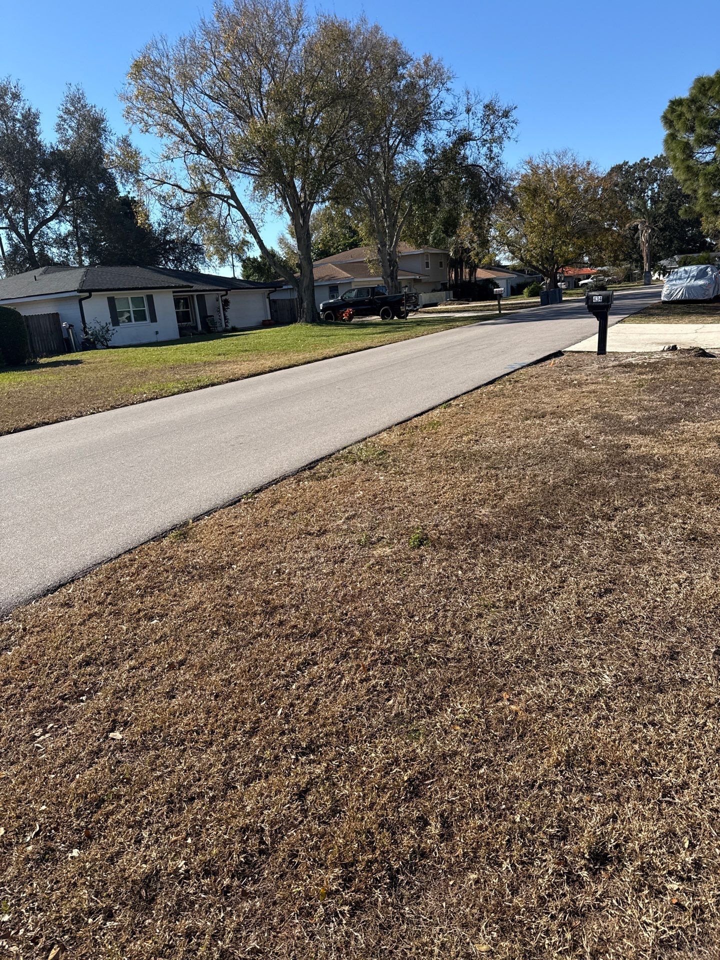 Downspout Installation using Downspout Extension and new Gutters in Winter Haven FL by Gutter Professors