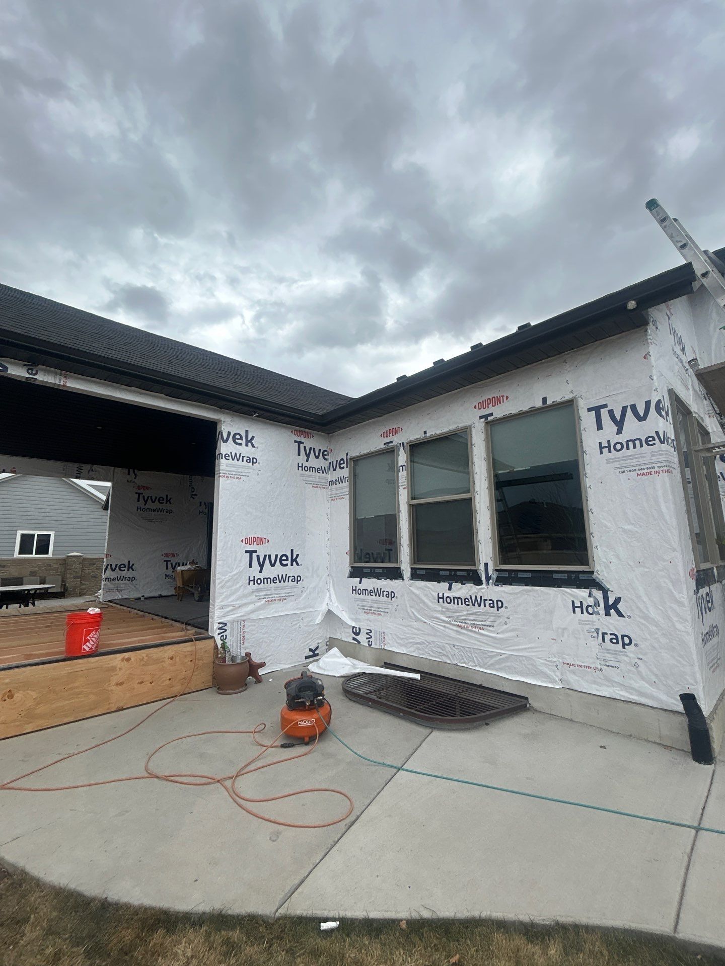 South Jordan | Massive Board & Batten Upgrade | Cobble Stone & Dark Bronze by Ideal Siding Utah