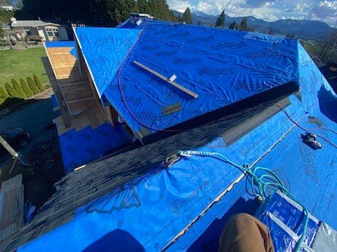 Residential Roofing Installation using Malarky Vista Midnight black by Top Notch Roofing Inc