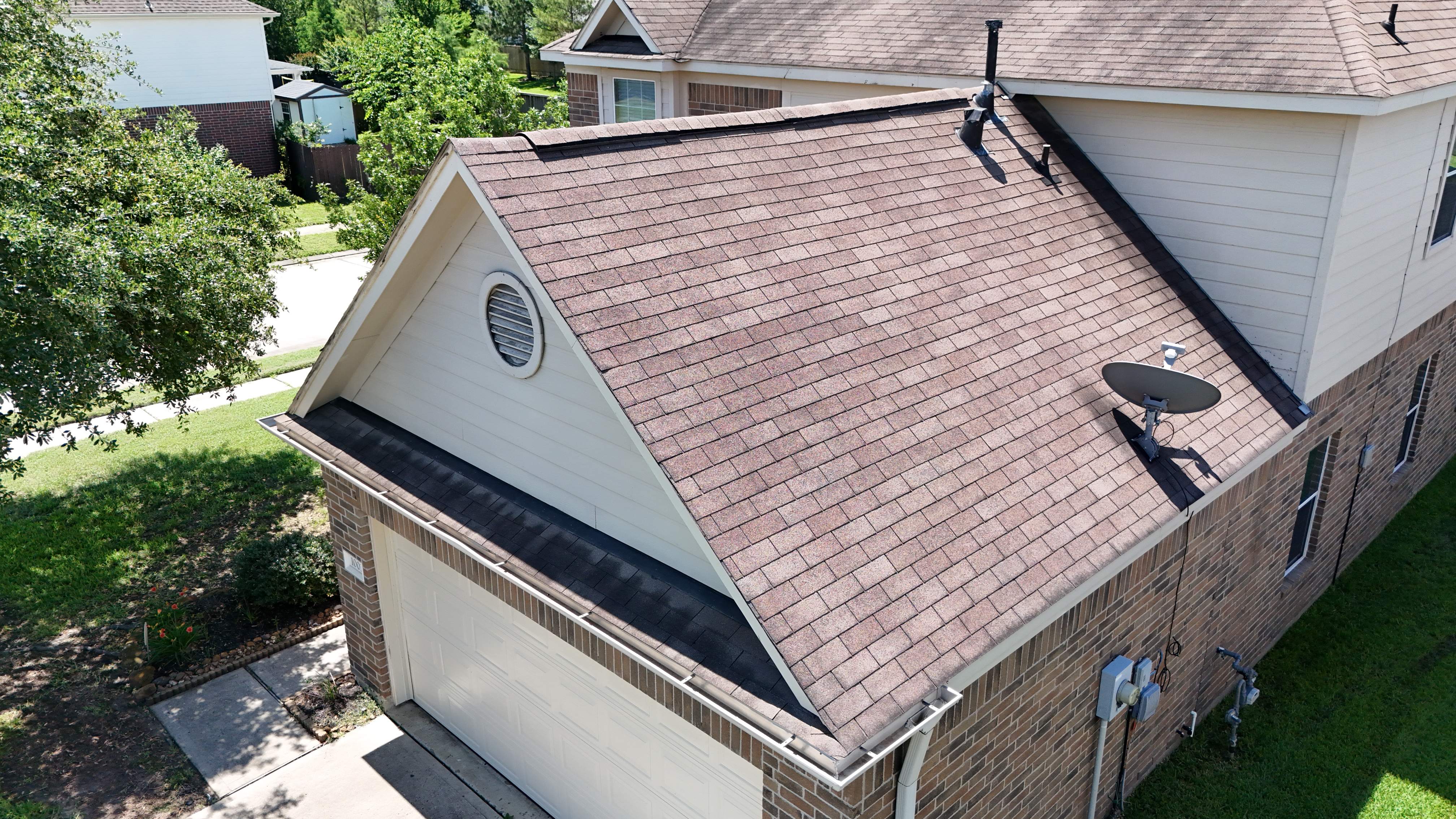 Full Roof Replacement in Warm Brown Tones — Spring, TX by PL Roofing & SB Roofing, LLC.