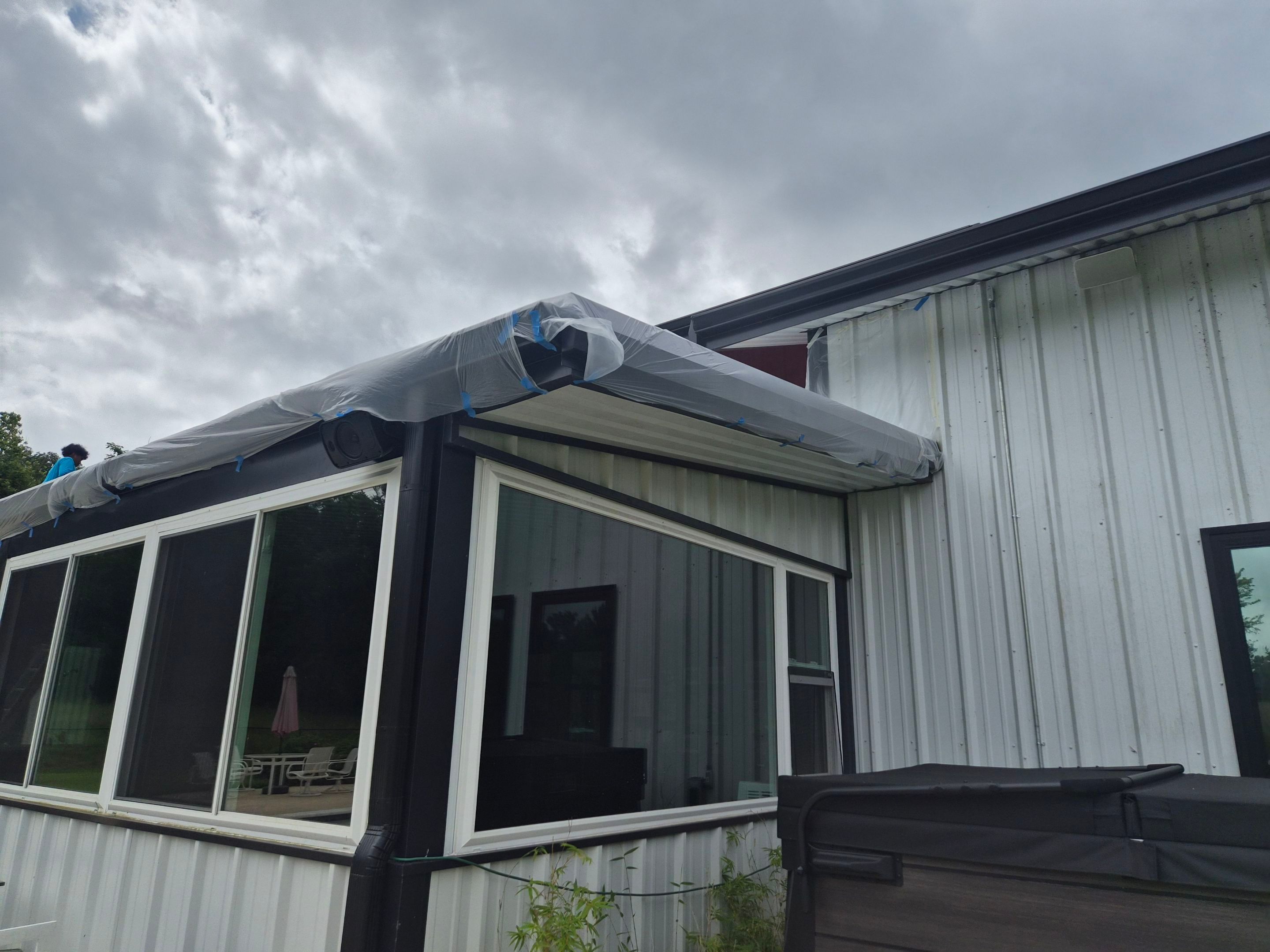 A Fresh Sunroom Roof in Flint, TX! by Quality Coats Painting
