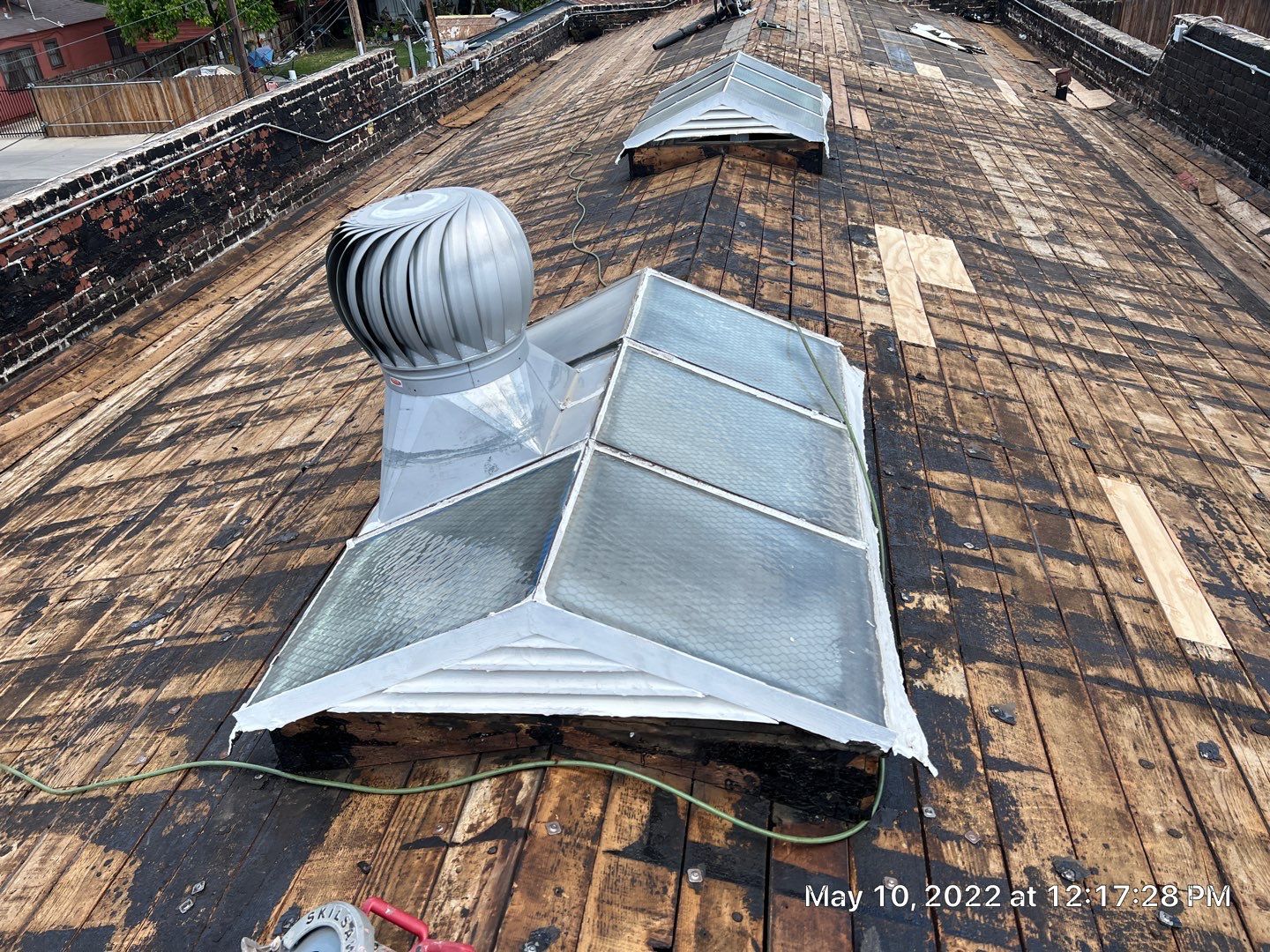 Commercial Roofing Installation using Conklin BenchPly system with PUMA top coat (imbedded fabric system) by Straight Edge Roofing Inc