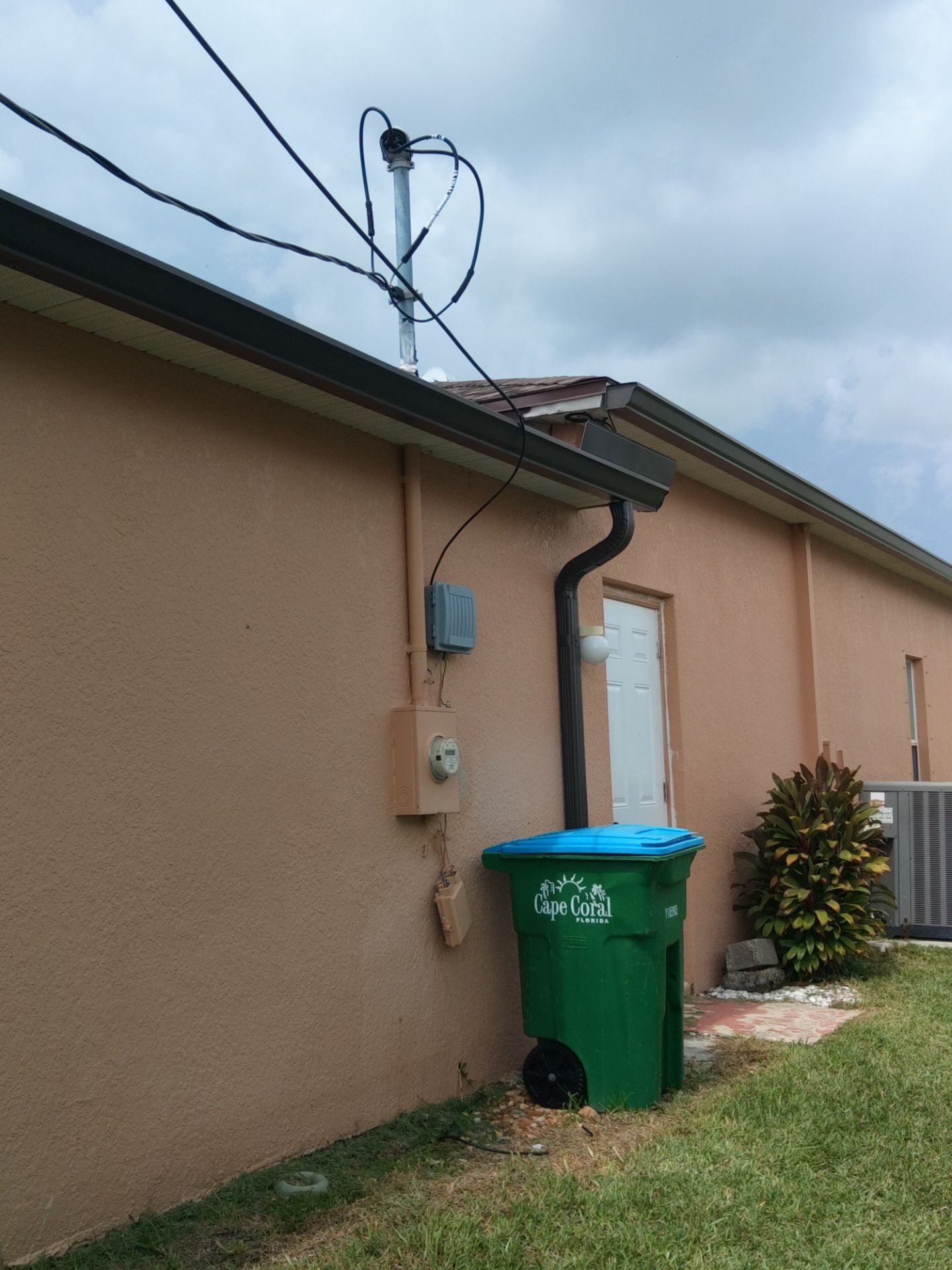 Downspout Installation for Multi-Story Homes in Cape Coral FL by Gutter Professors