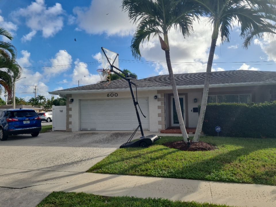 Residential Roofing Installation using 1" Nail strip metal roof by BLUES BROTHERS CONSTRUCTION CORP